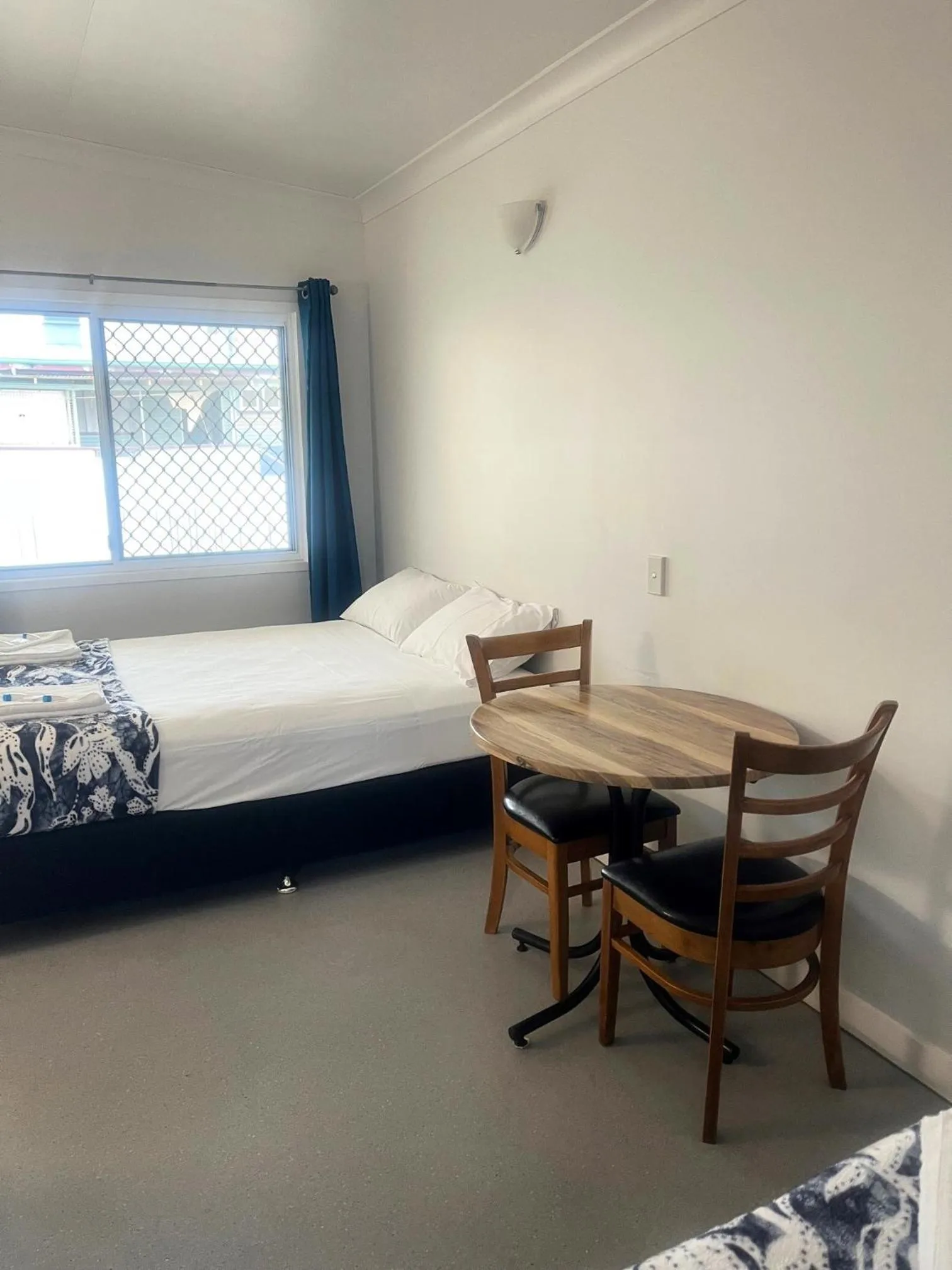 Seating area, Bed in Grand Hotel Mount Morgan