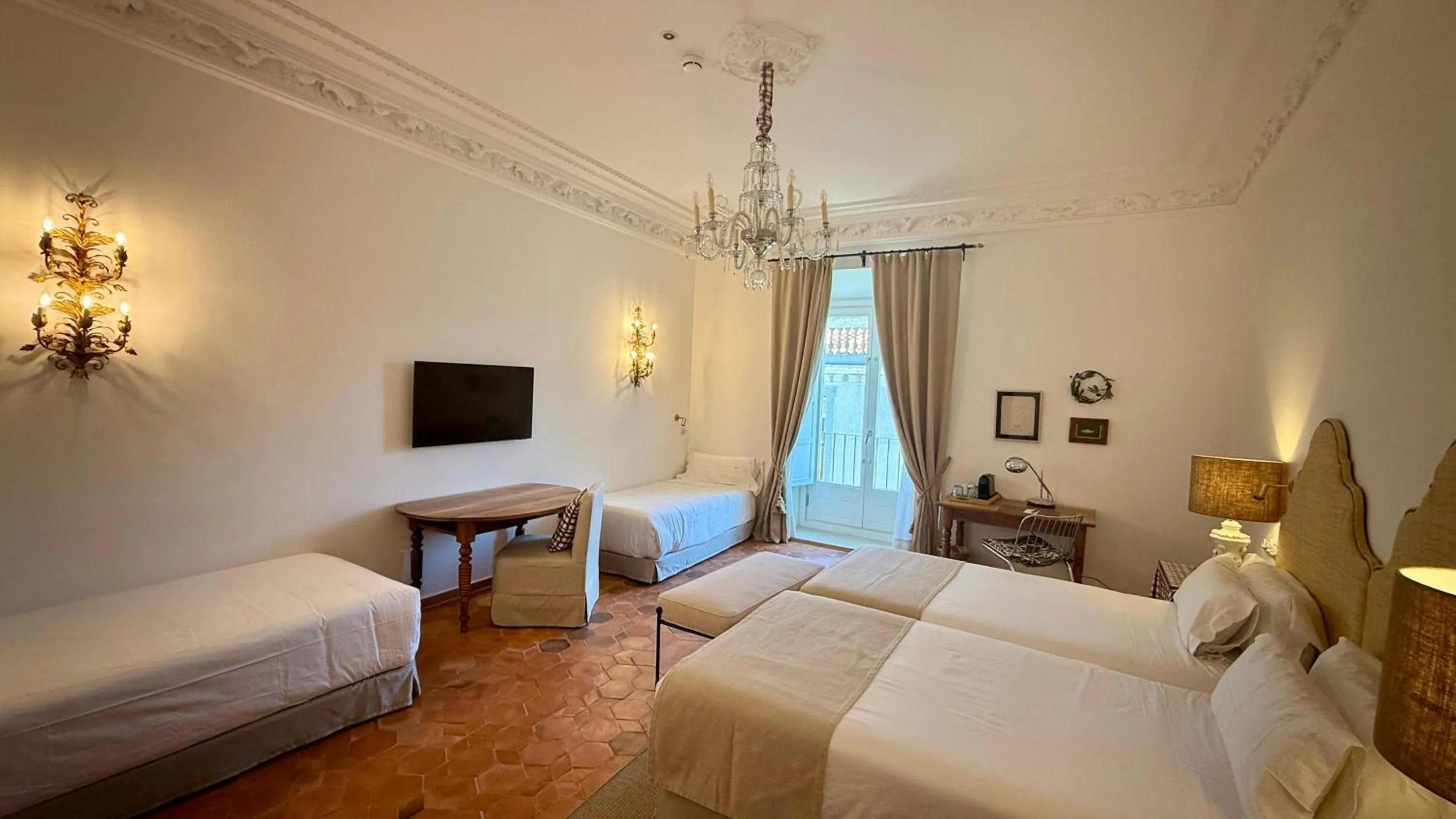 Bed in Casa Pizarro Hotel