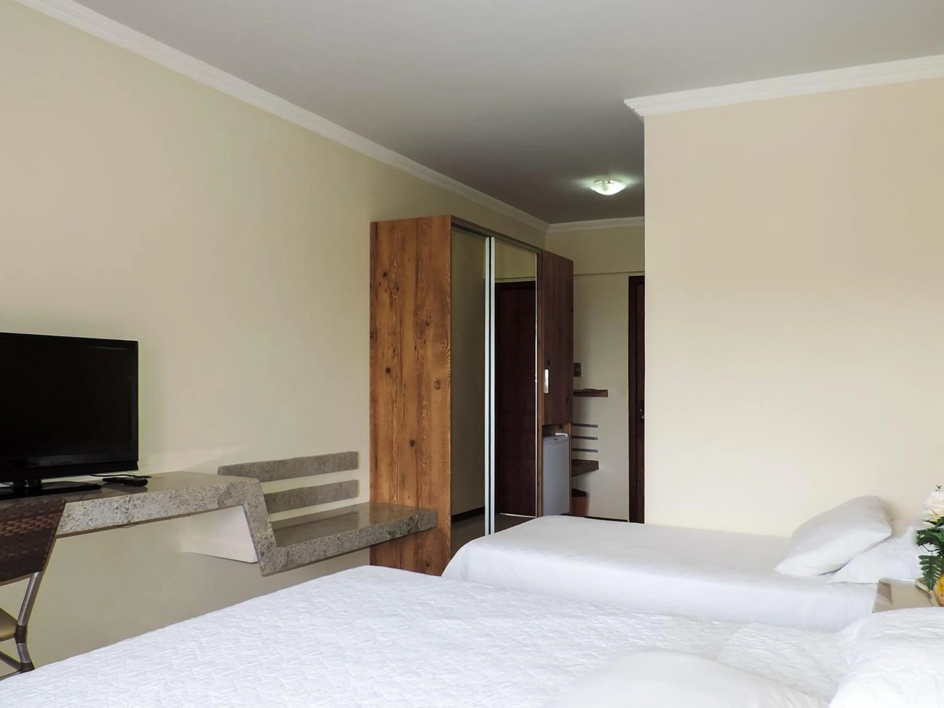 Bed in Golden Beach Hotel