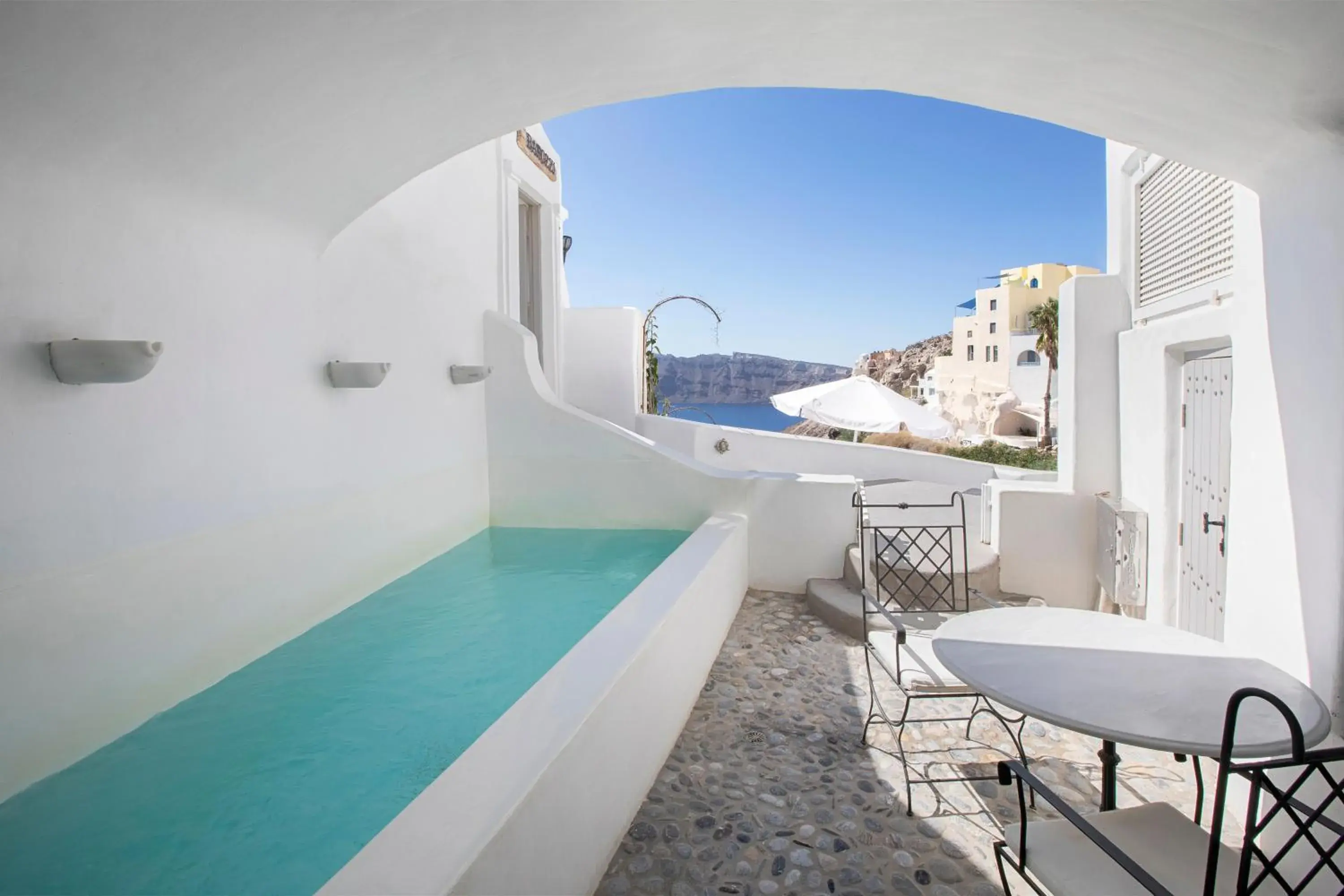Double Room with Sharing Plunge Pool and Partial Caldera View in Ducato di Oia - Adults Only Double Room with Sharing Plunge Pool and Partial Caldera View in Ducato di Oia - Adults Only