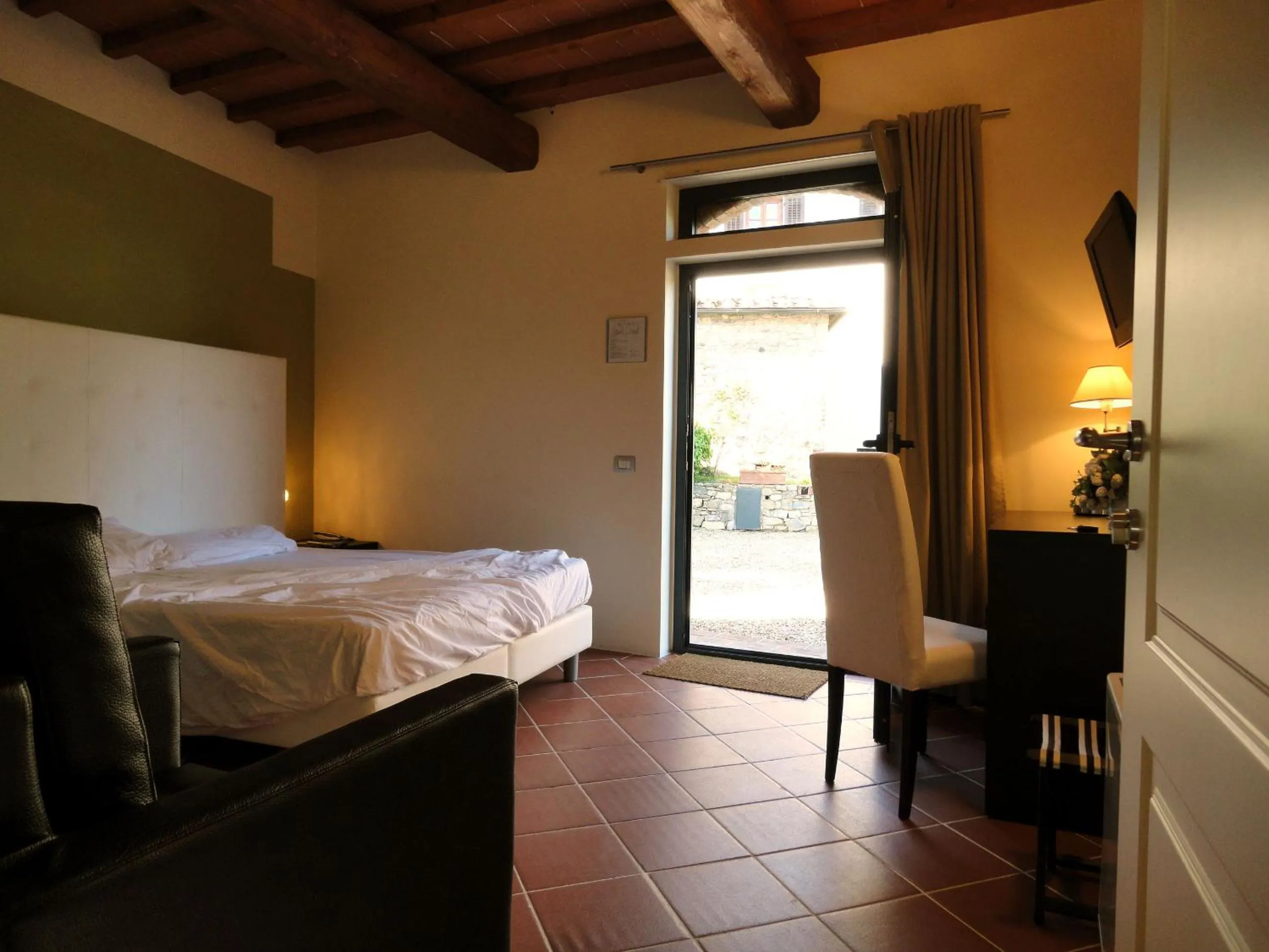 Photo of the whole room, Bed in Il Poggiolo Delle Rose Bed&Breakfast