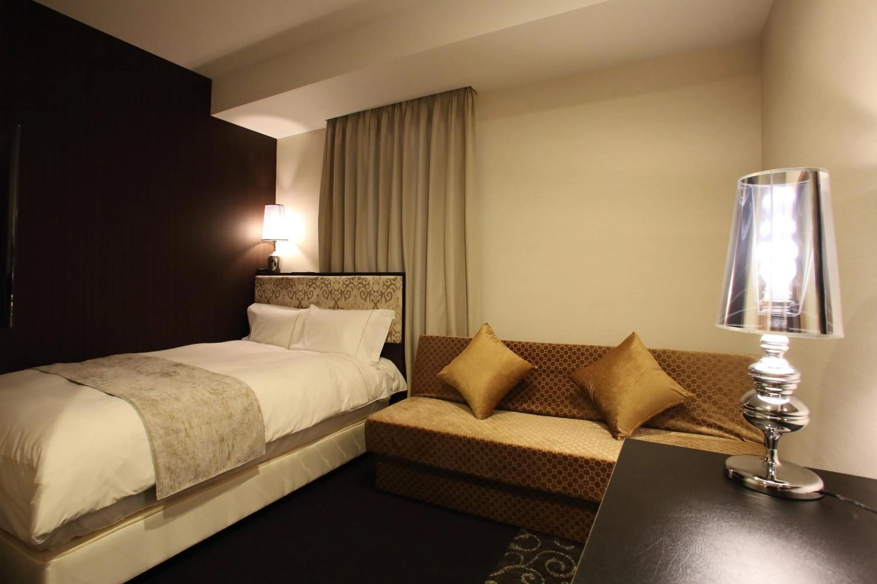 Photo of the whole room, Bed in Centurion Hotel Grand Kobe Station