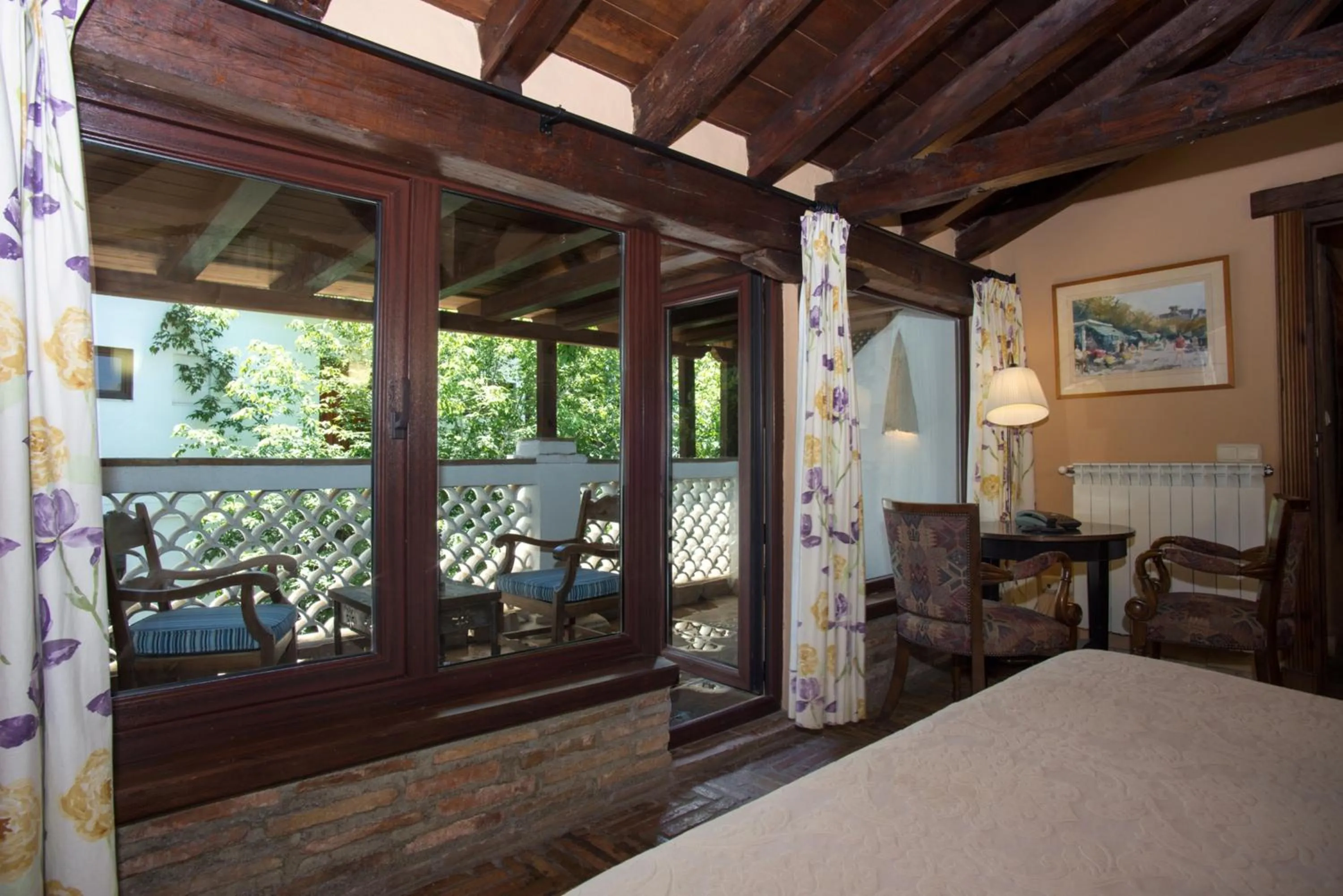 Seating area, Bed in Hotel América