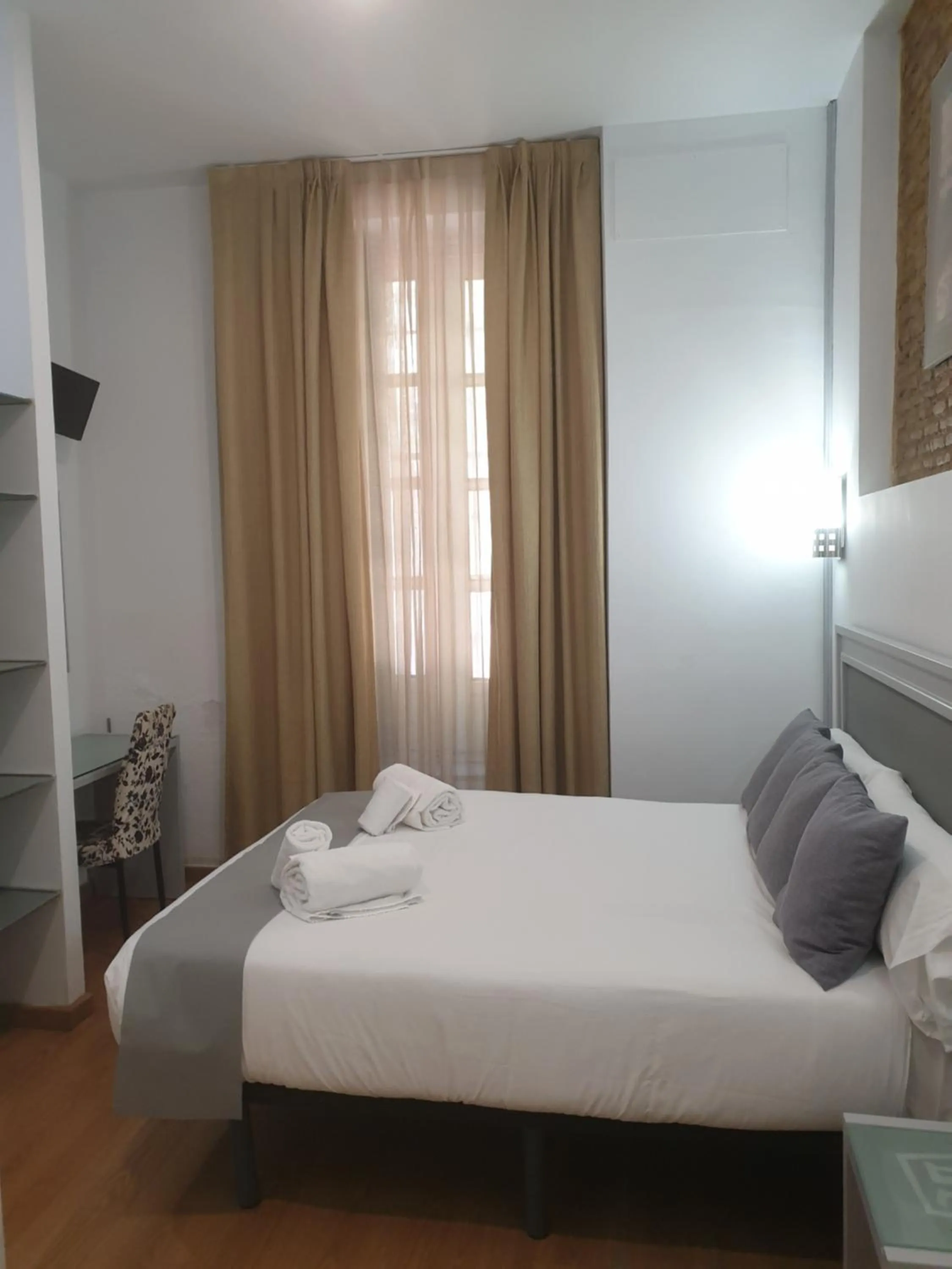 Bed in Hotel y Apartamentos Doña Lola