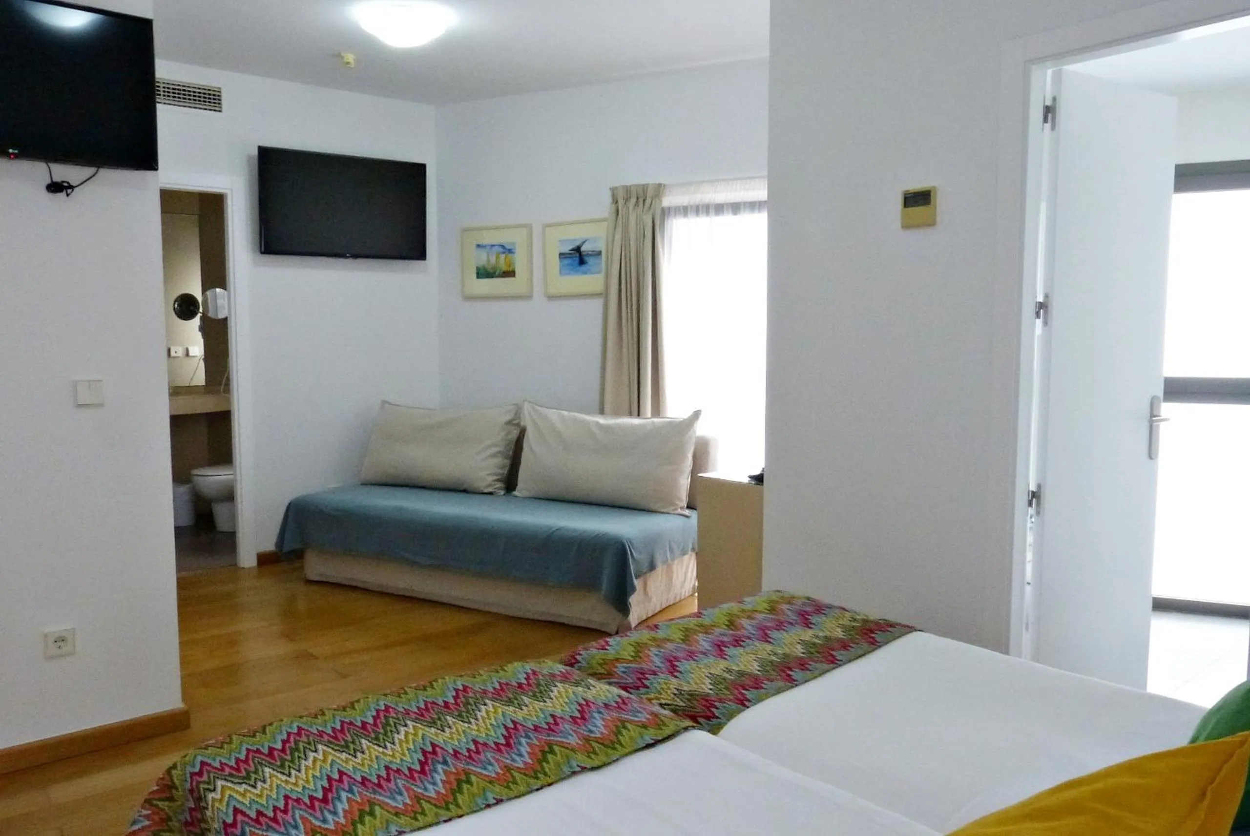 Bed in Hotel Apartamentos Patagonia Sur