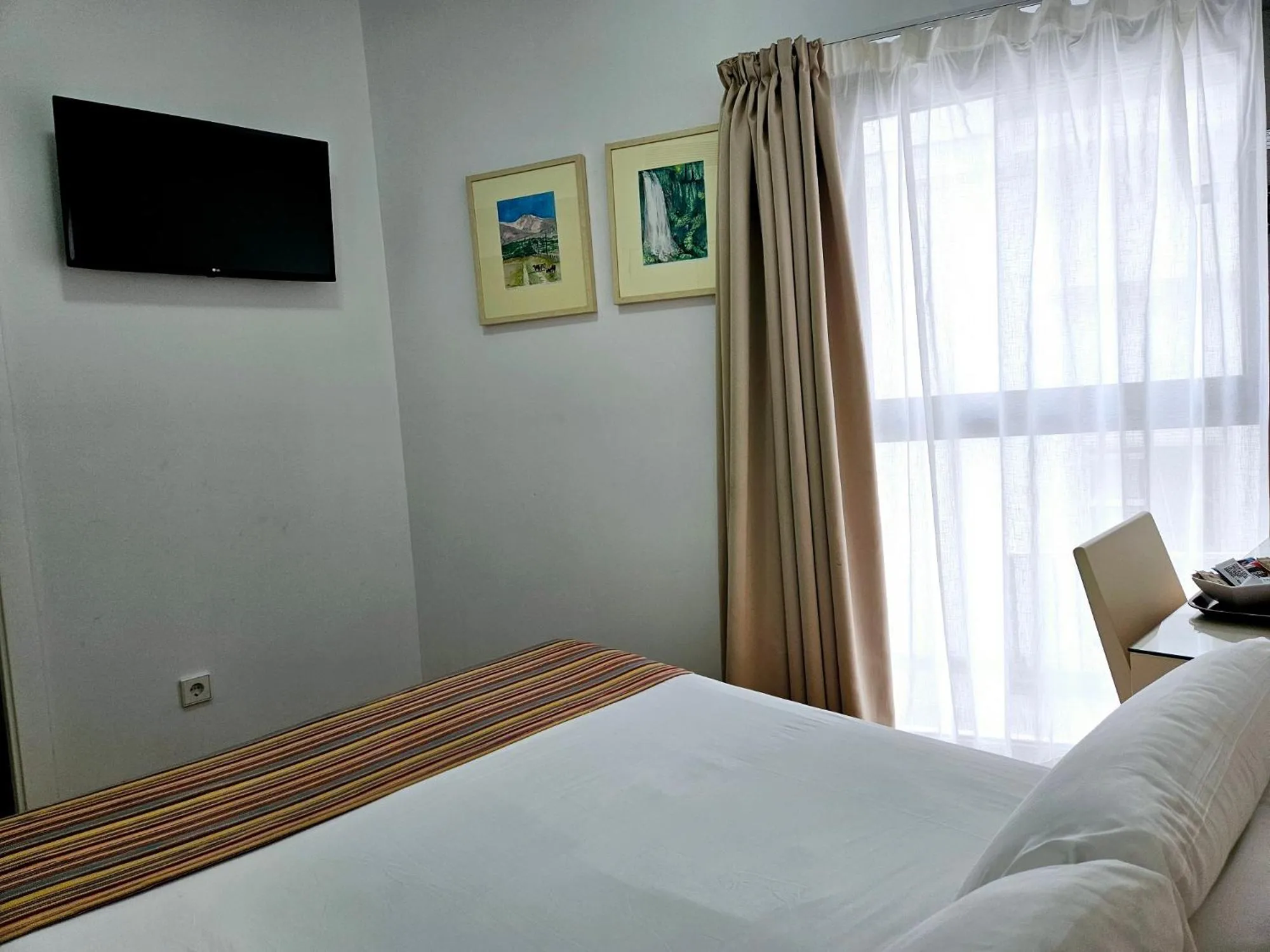 Bed in Hotel Apartamentos Patagonia Sur