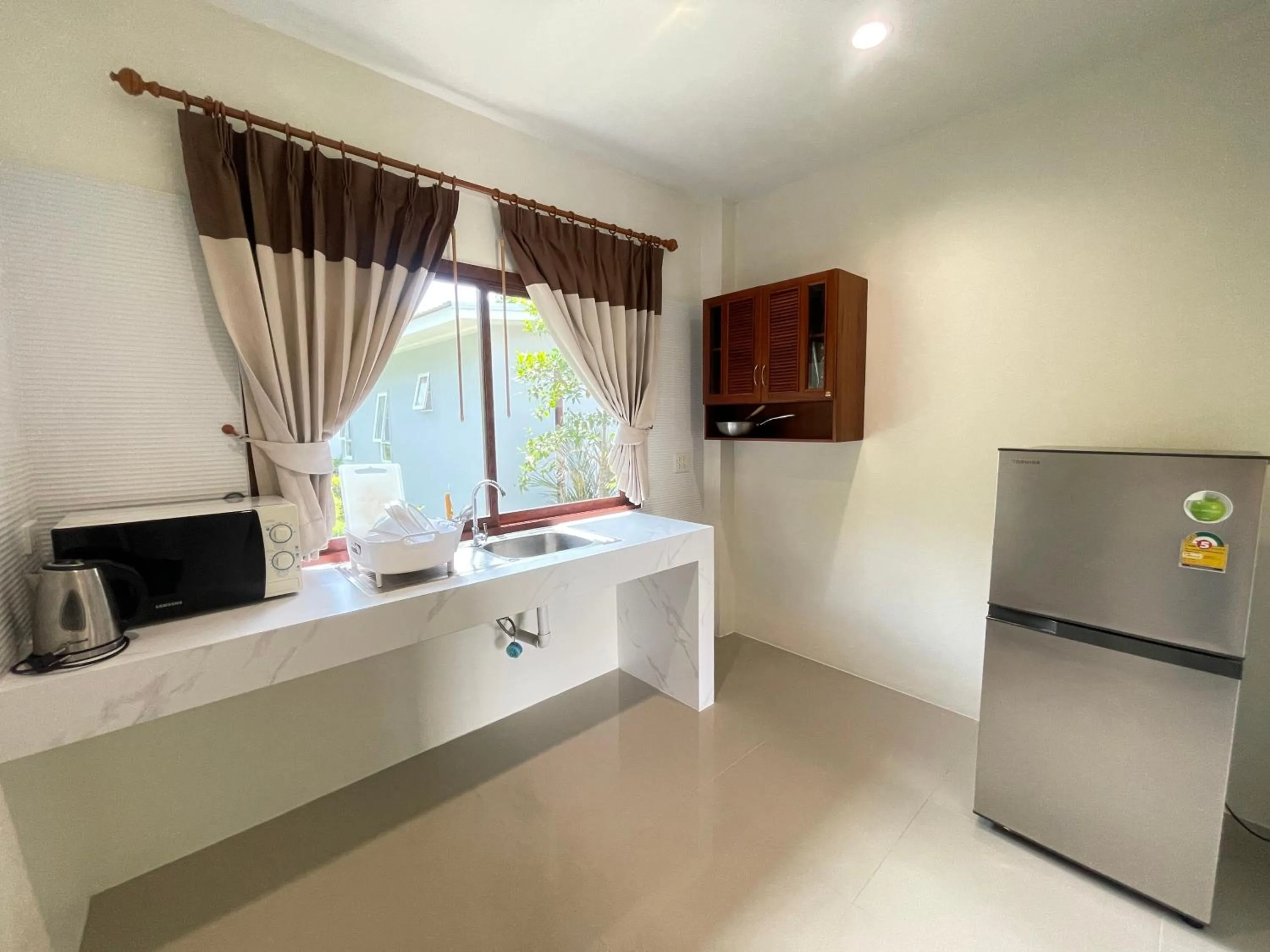 Kitchen or kitchenette in Breeze Bay Villas Koh Phangan