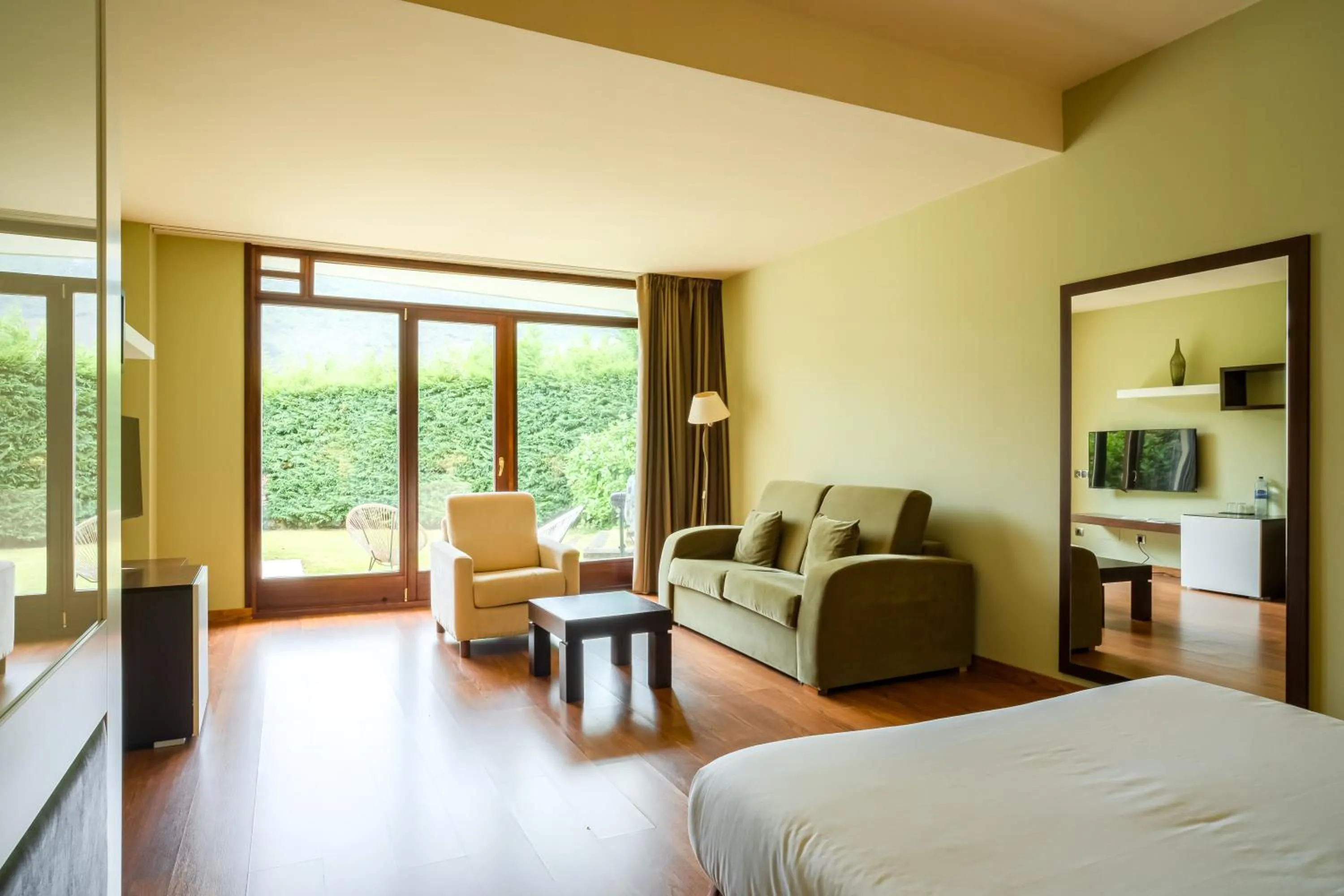 Living room, Bed in Indiana Boutique Hotel