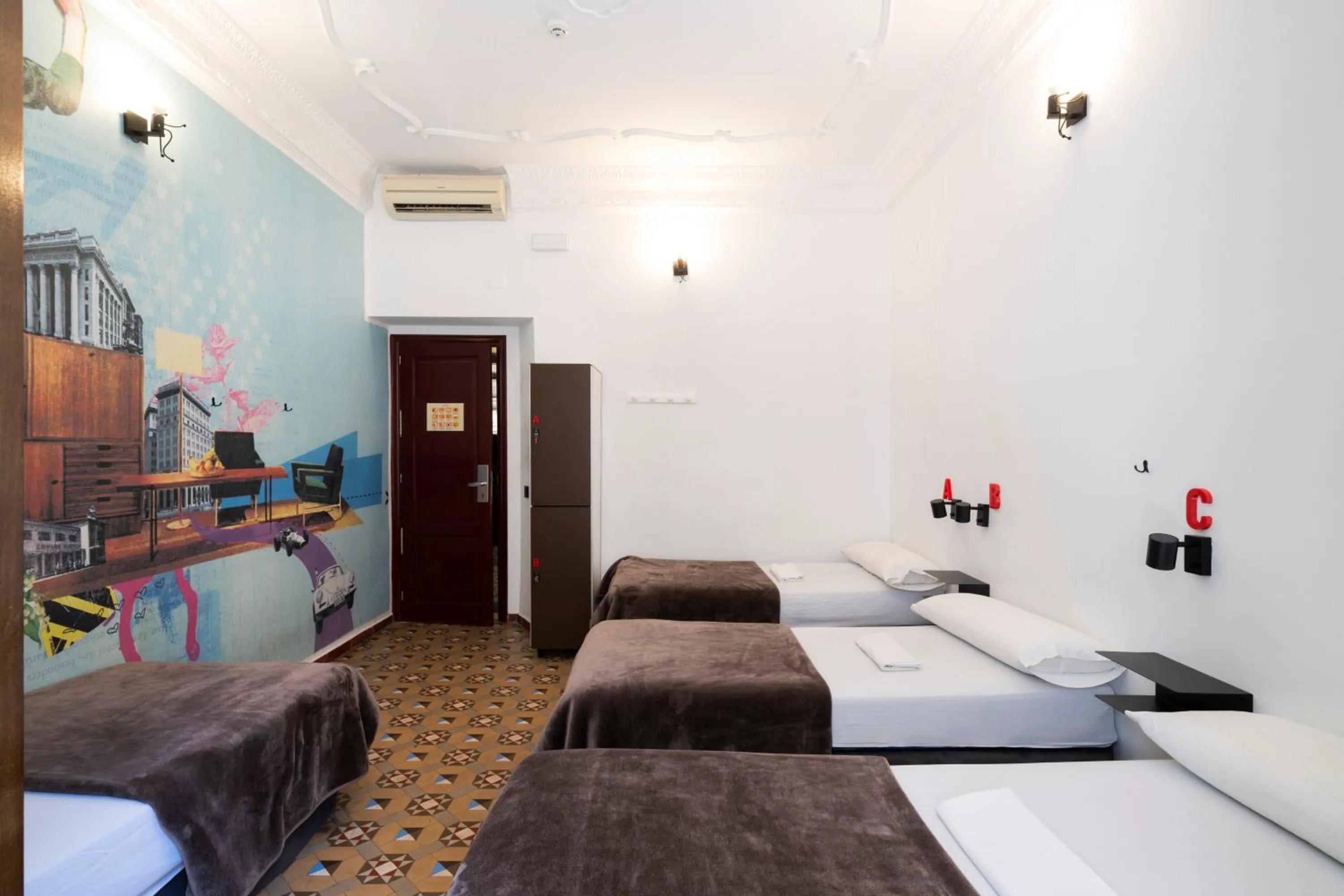 Bed in Home Youth Hostel by Feetup Hostels