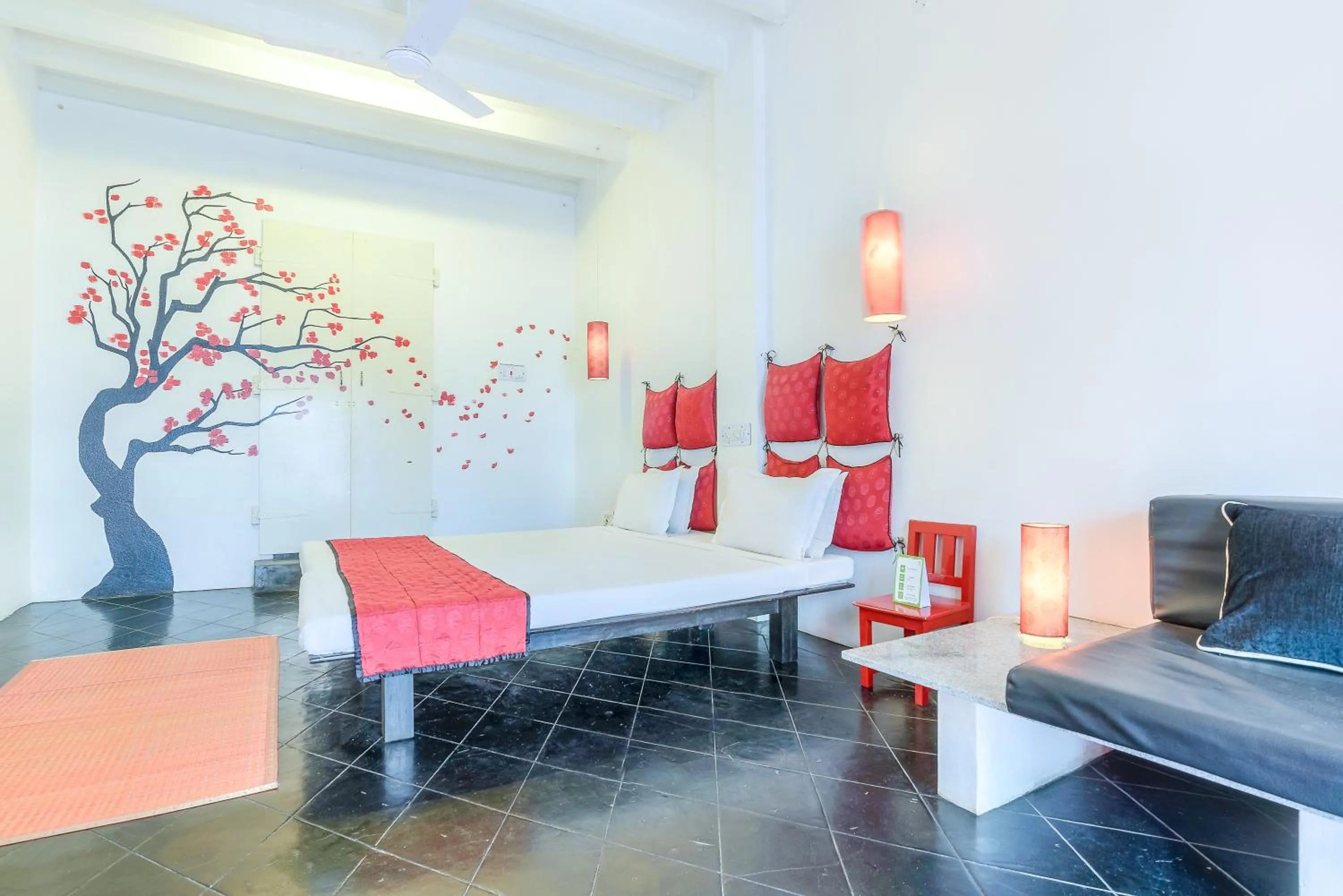 Photo of the whole room in Itsy Hotels Red Lotus Heritage, Promenade Beach