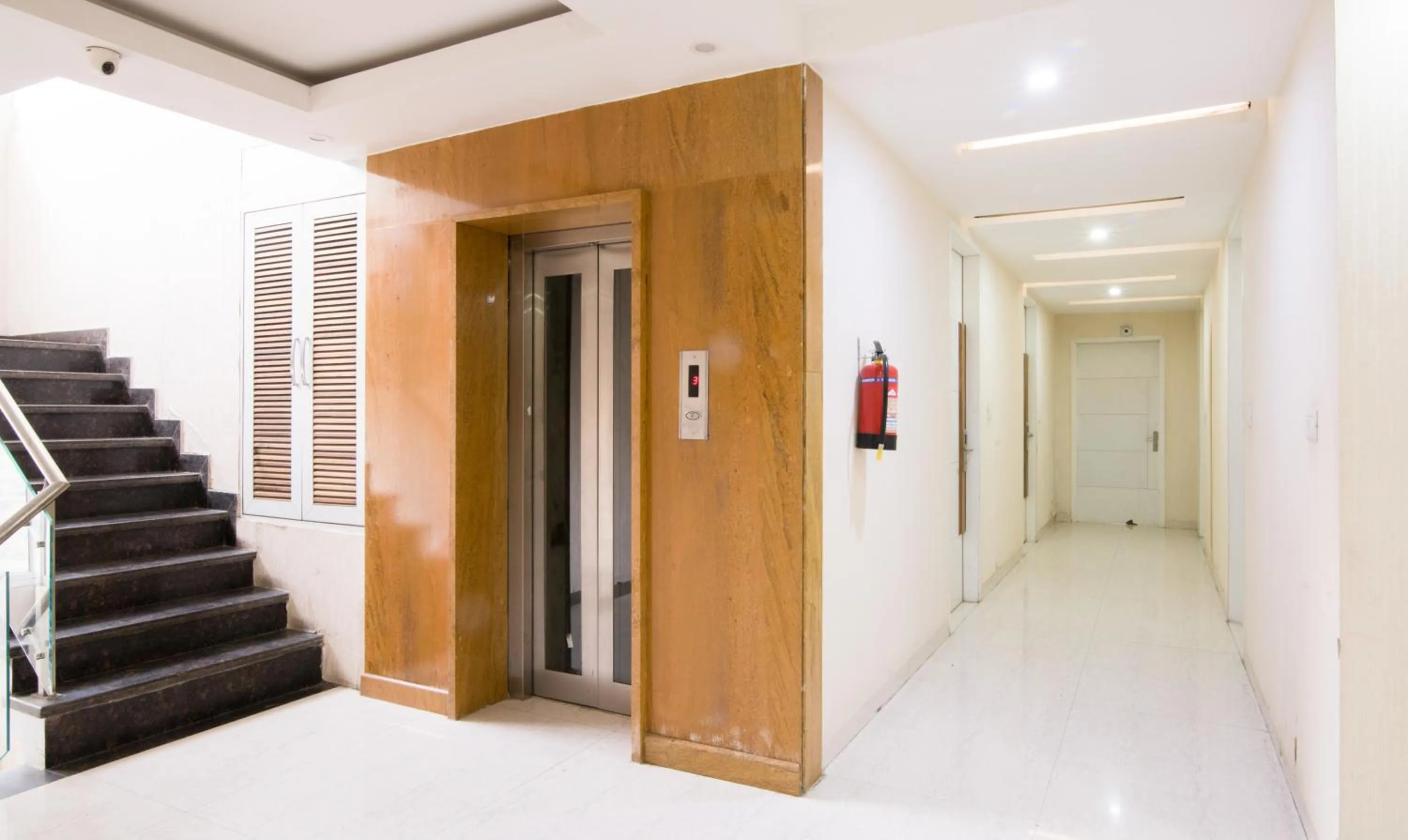 elevator in Treebo House Inn