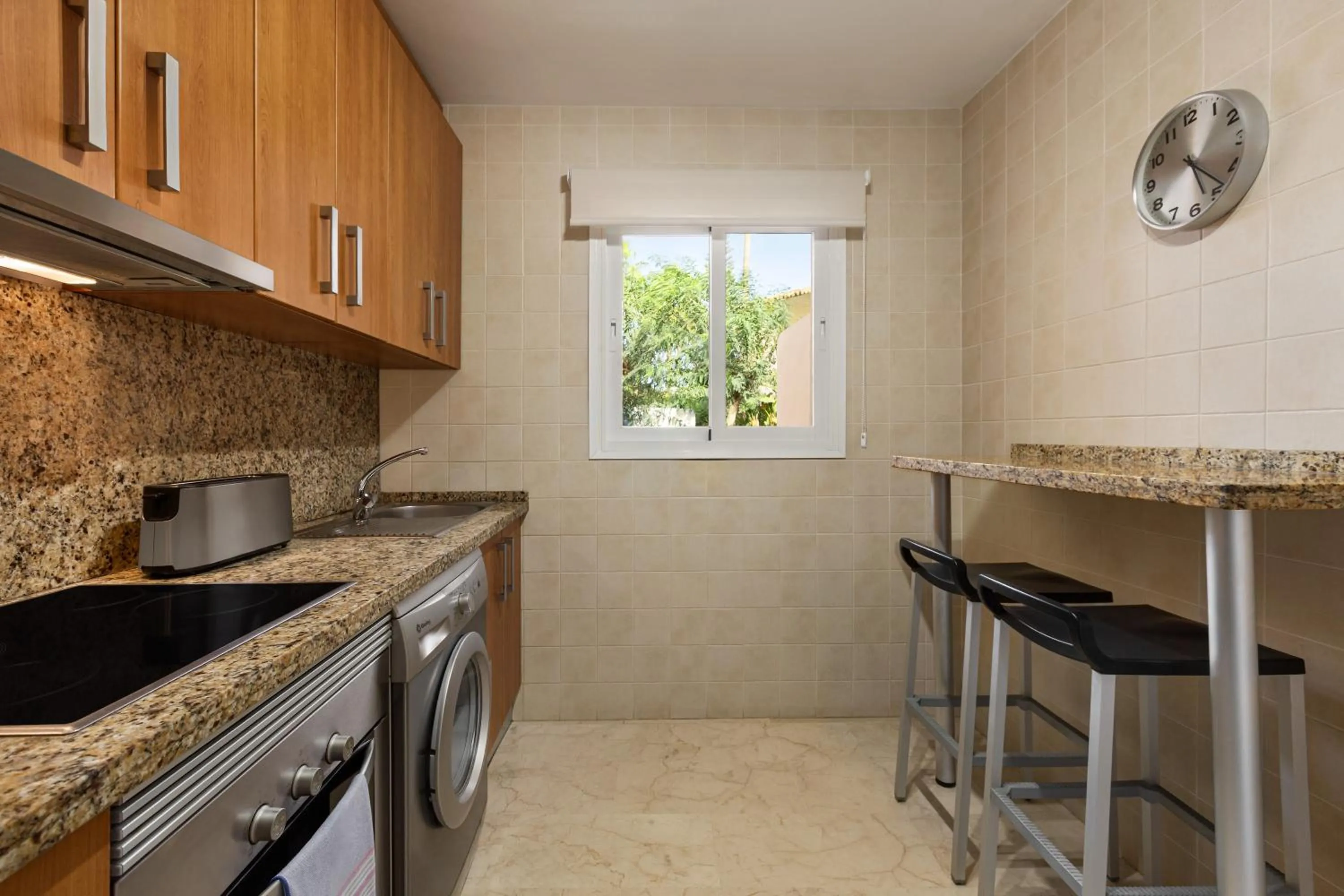 kitchen in Ramada Hotel & Suites by Wyndham Costa del Sol