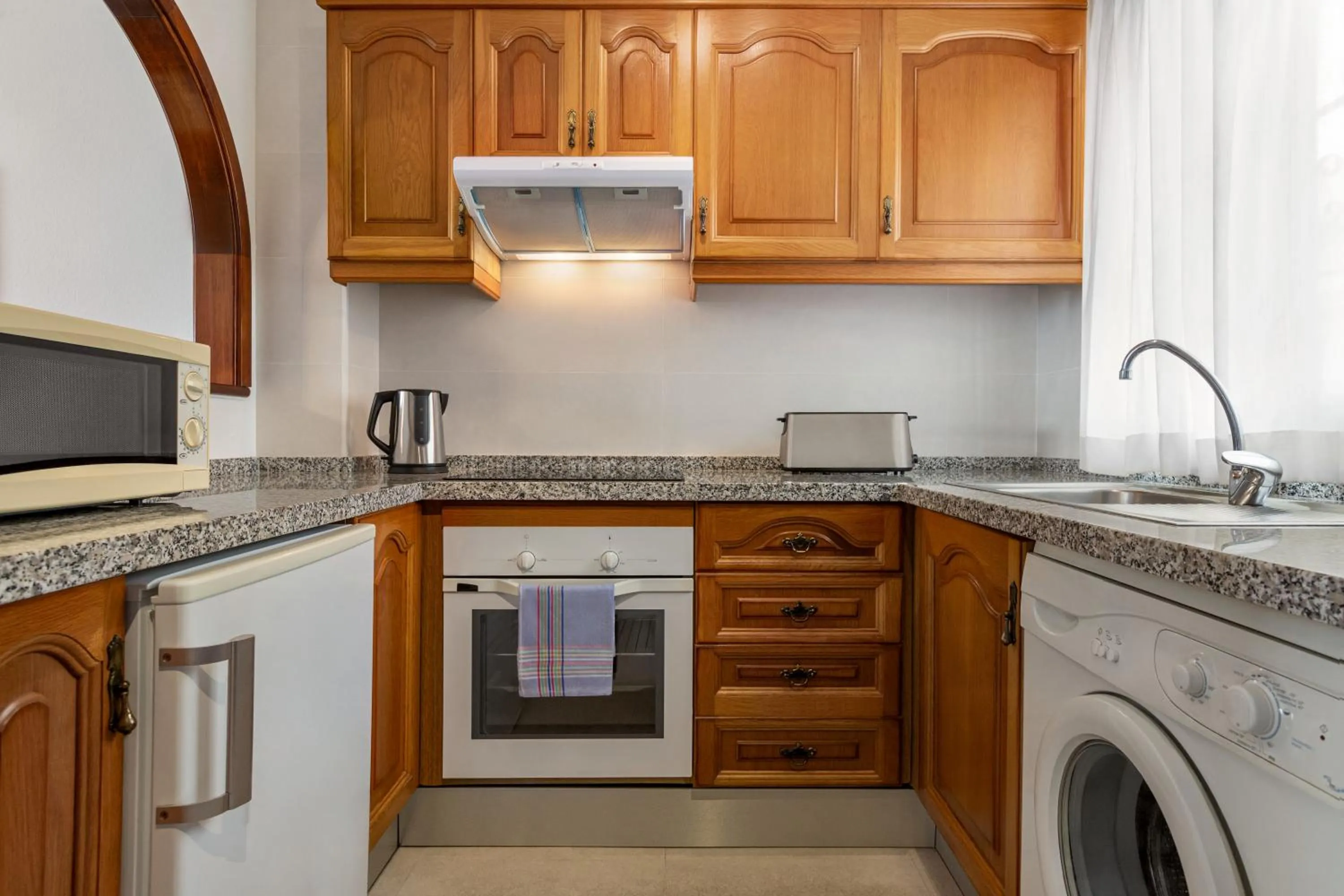 kitchen in Ramada Hotel & Suites by Wyndham Costa del Sol