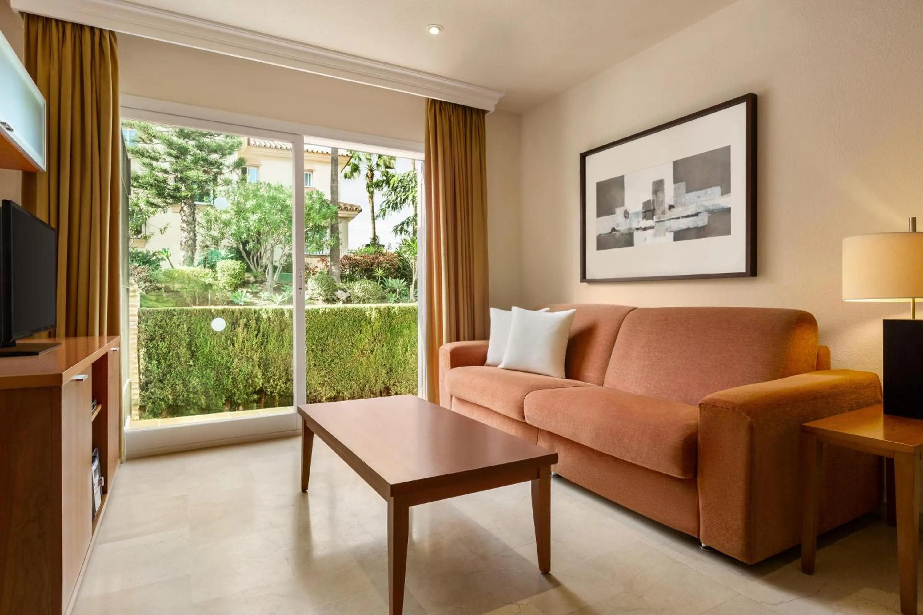 Living room in Ramada Hotel & Suites by Wyndham Costa del Sol