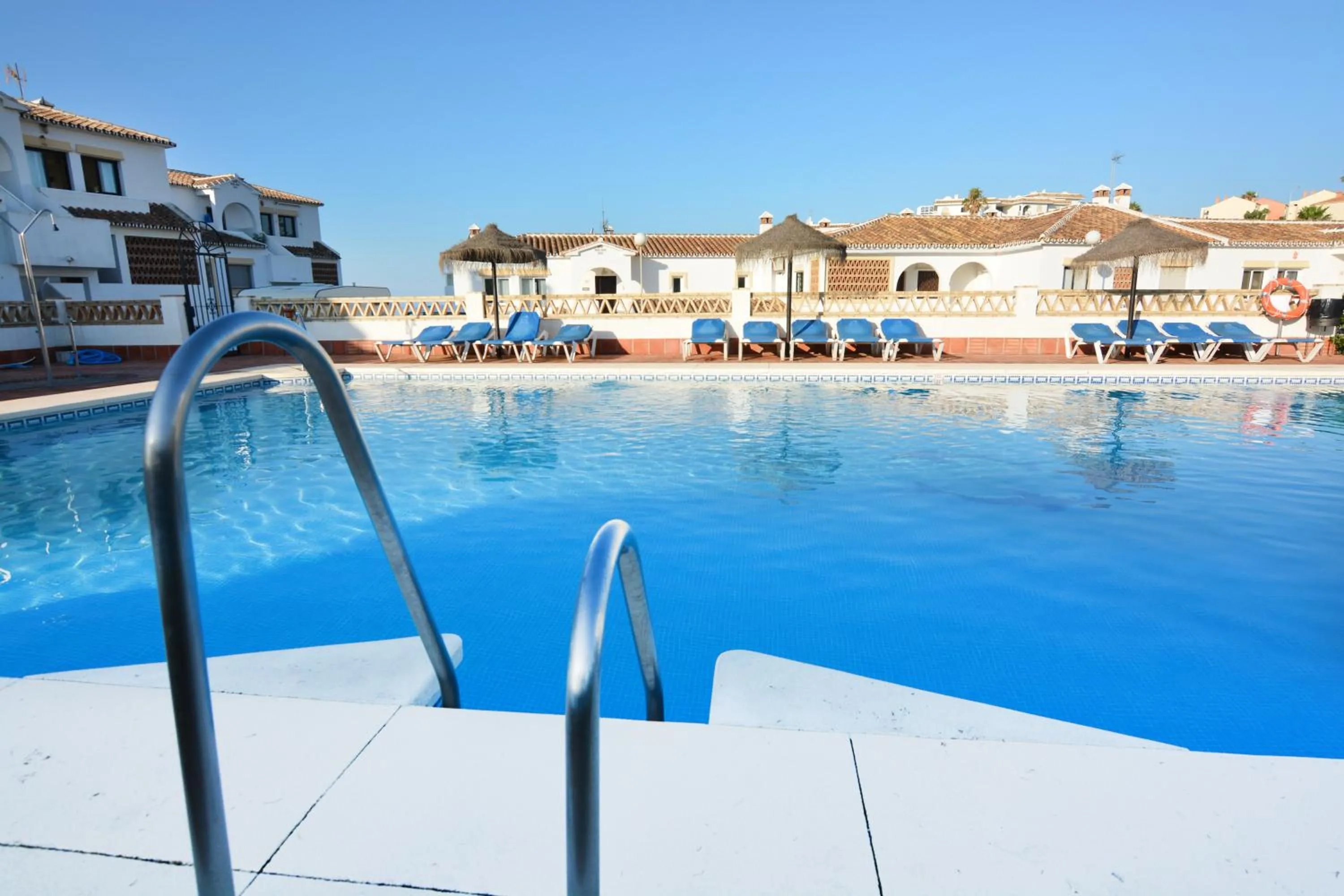 Swimming pool in Ramada Hotel & Suites by Wyndham Costa del Sol