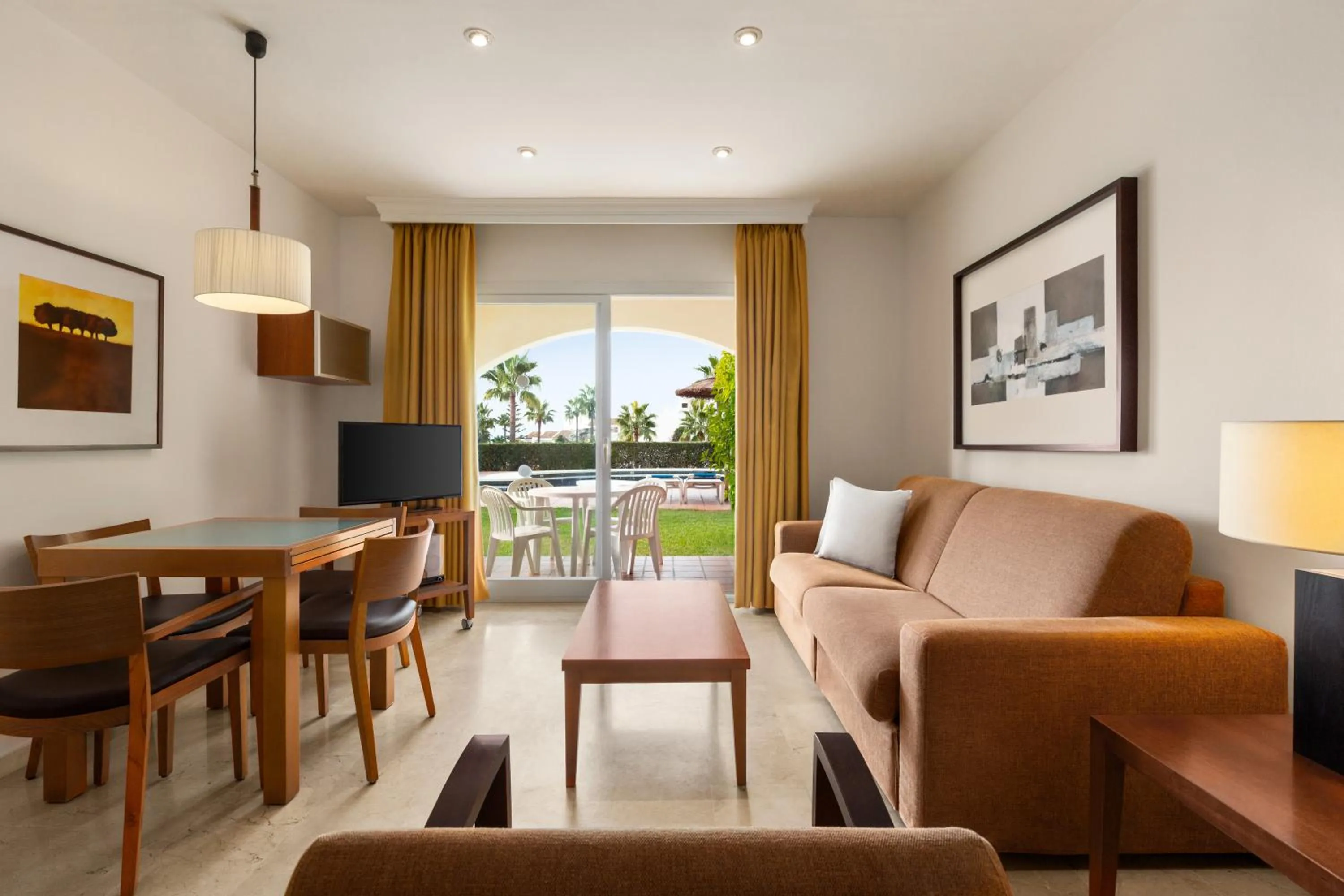 Living room in Ramada Hotel & Suites by Wyndham Costa del Sol