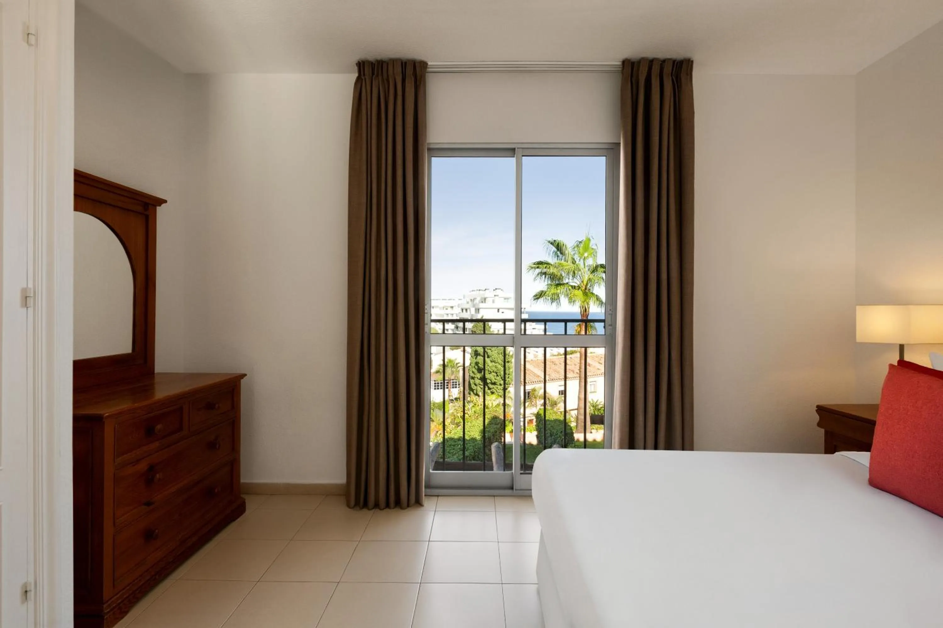 Bed in Ramada Hotel & Suites by Wyndham Costa del Sol