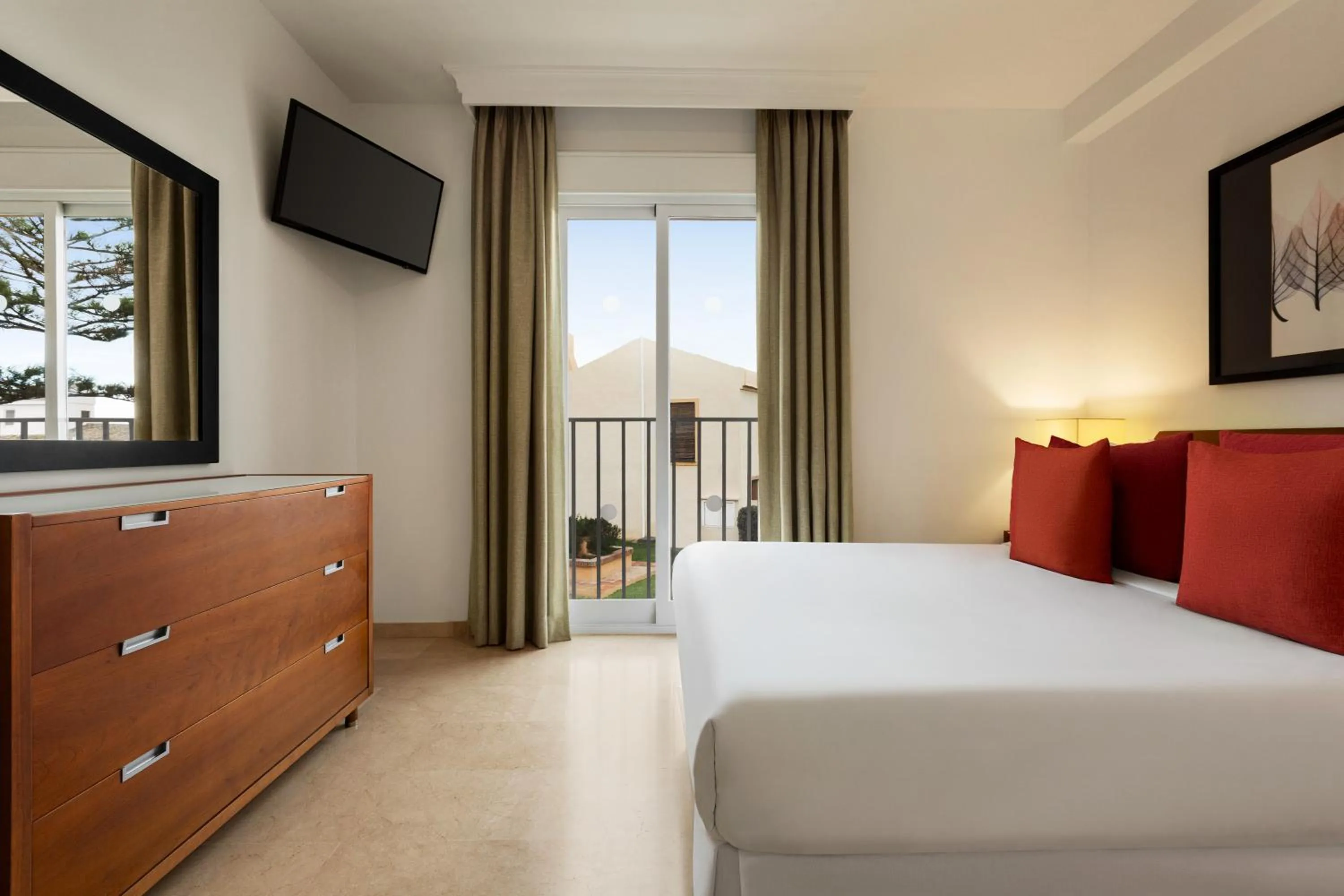 Bed in Ramada Hotel & Suites by Wyndham Costa del Sol