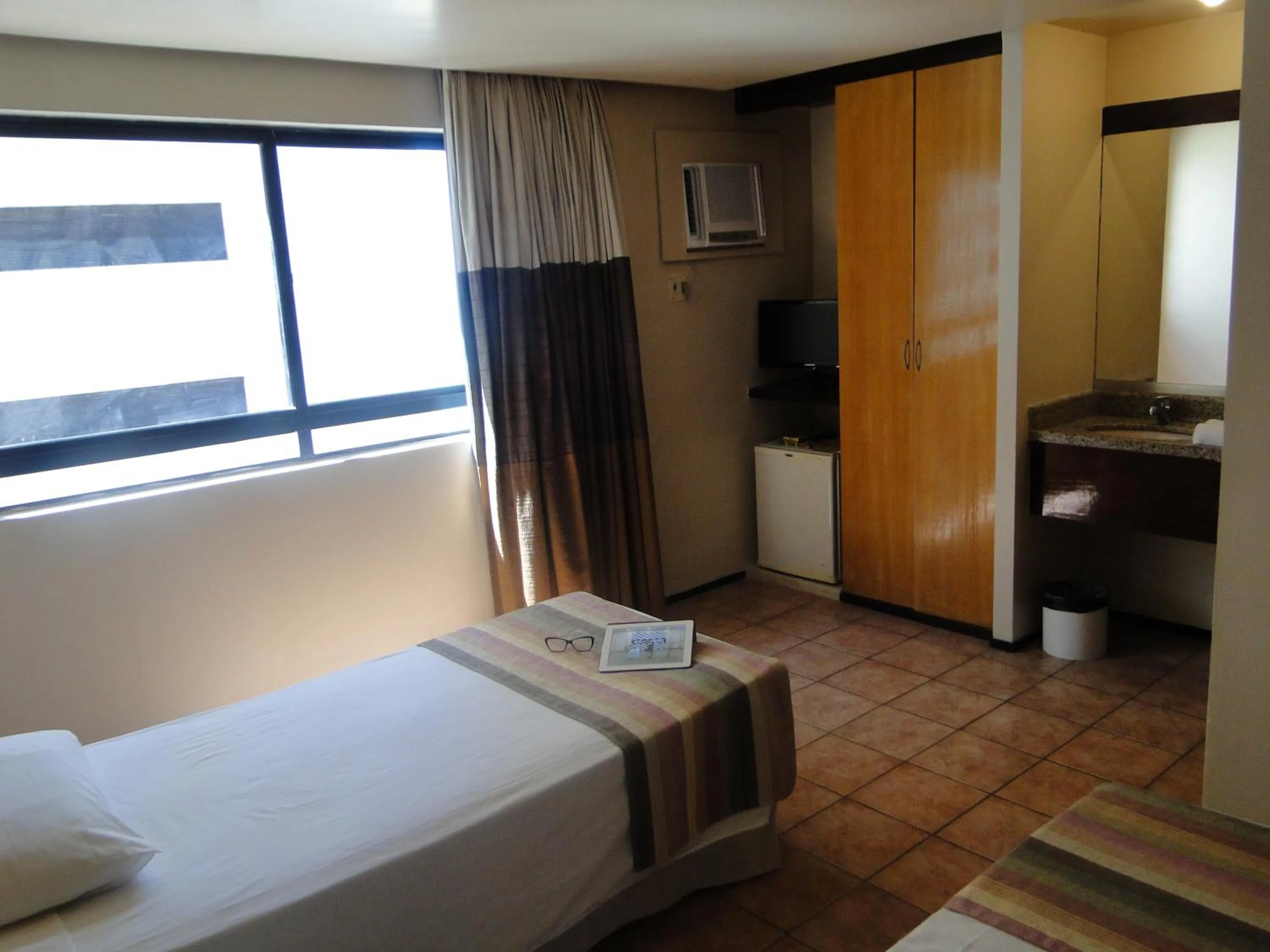 Bed in Plaza Praia Suítes