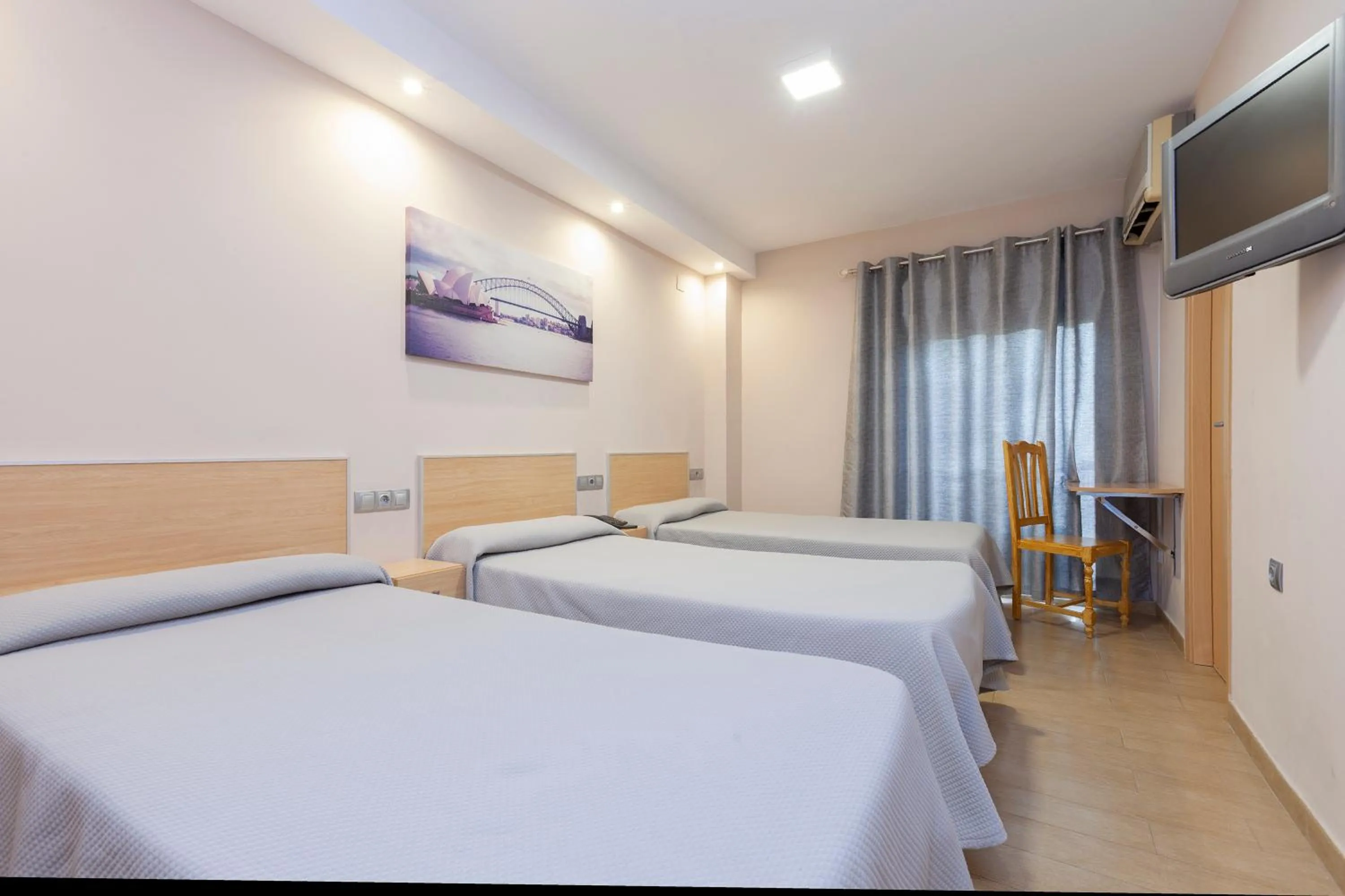 Photo of the whole room, Bed in Hotel Olympia Ronda I