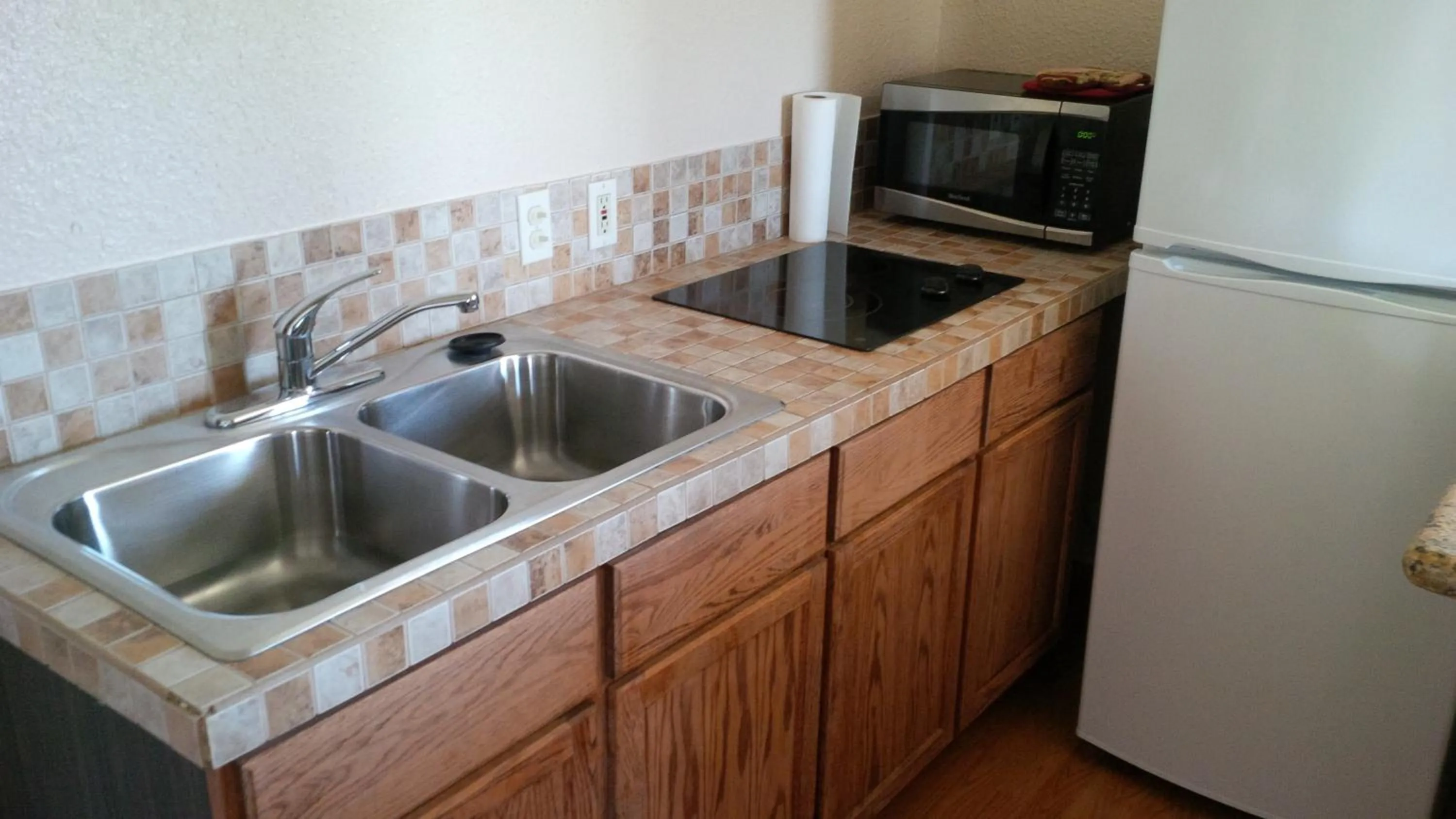 Kitchen or kitchenette in Alsi Resort Hotel