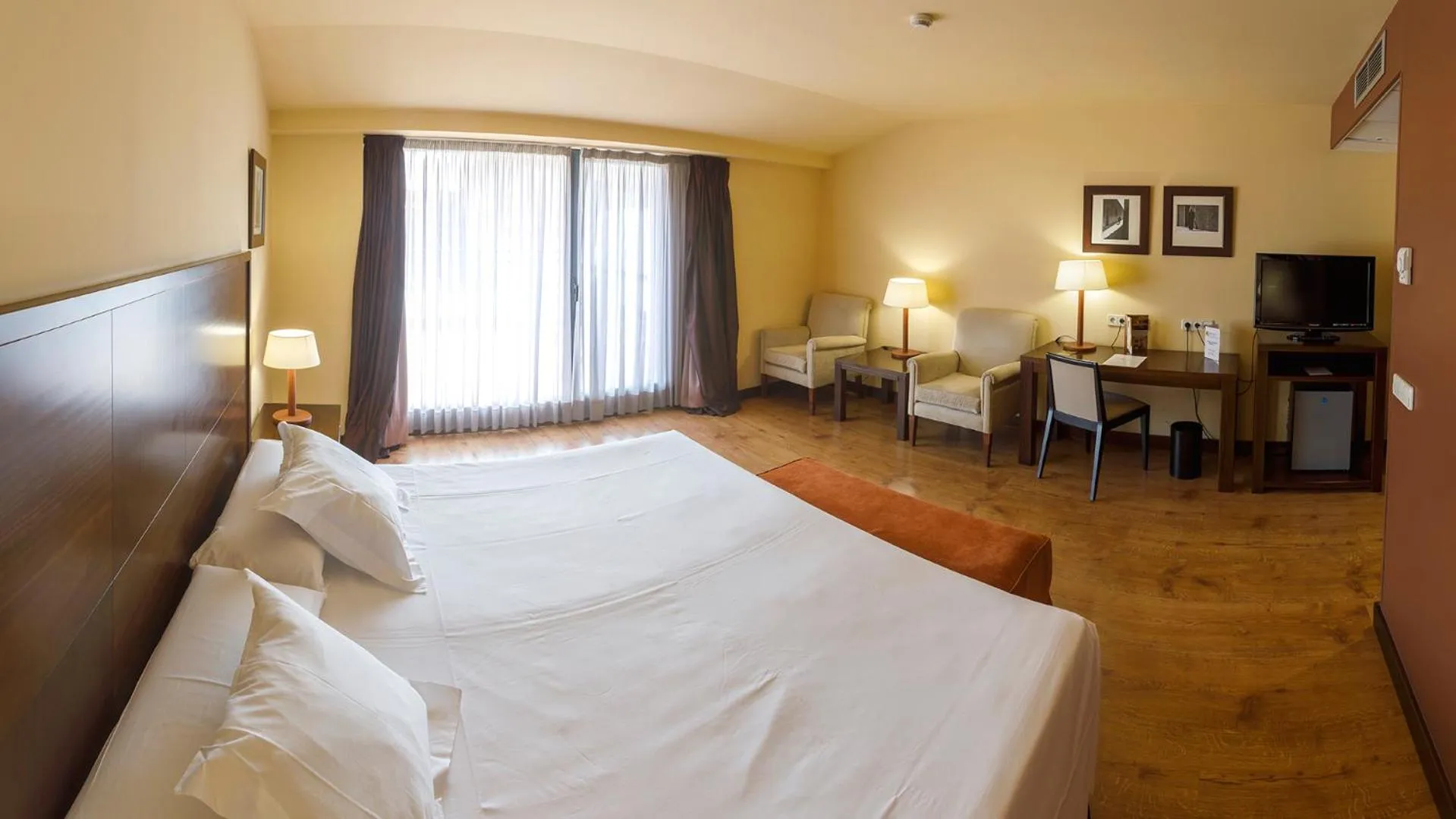 Photo of the whole room, Bed in Gran Hotel Ciudad de Barbastro