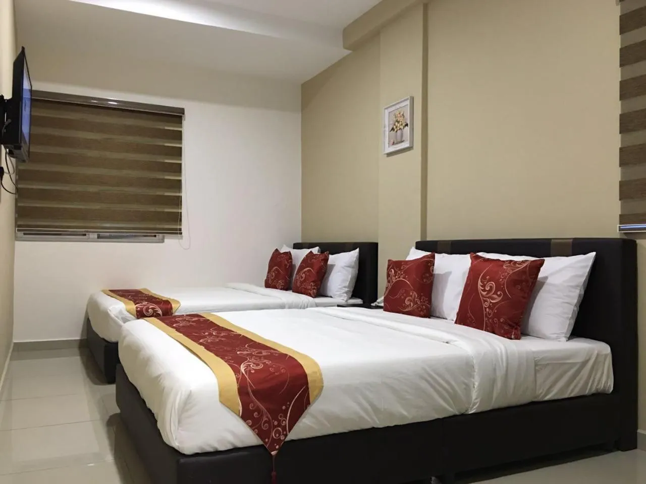 Bed in Global Inn Hotel