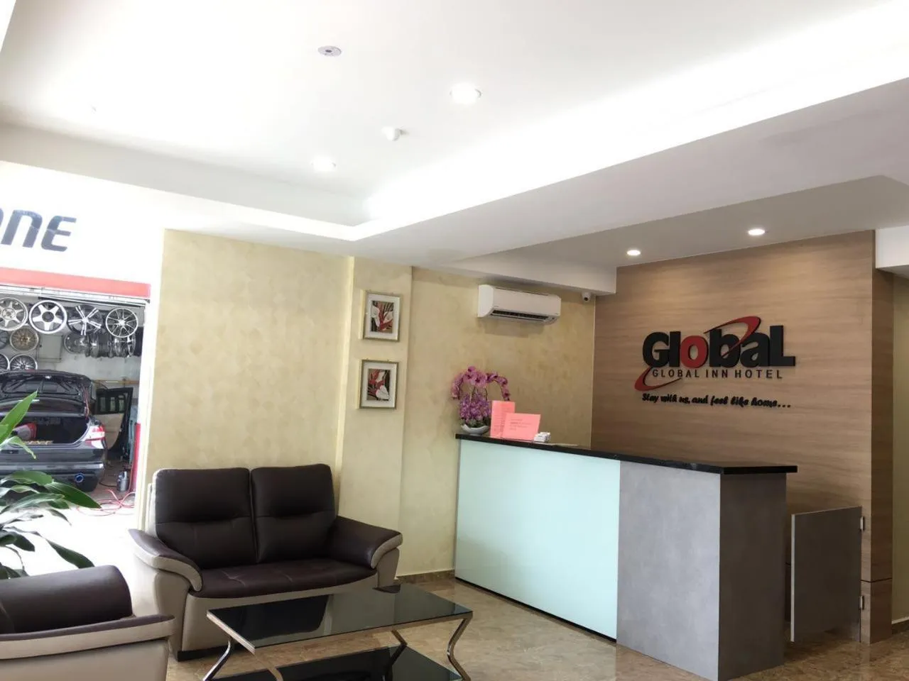 Lobby or reception in Global Inn Hotel