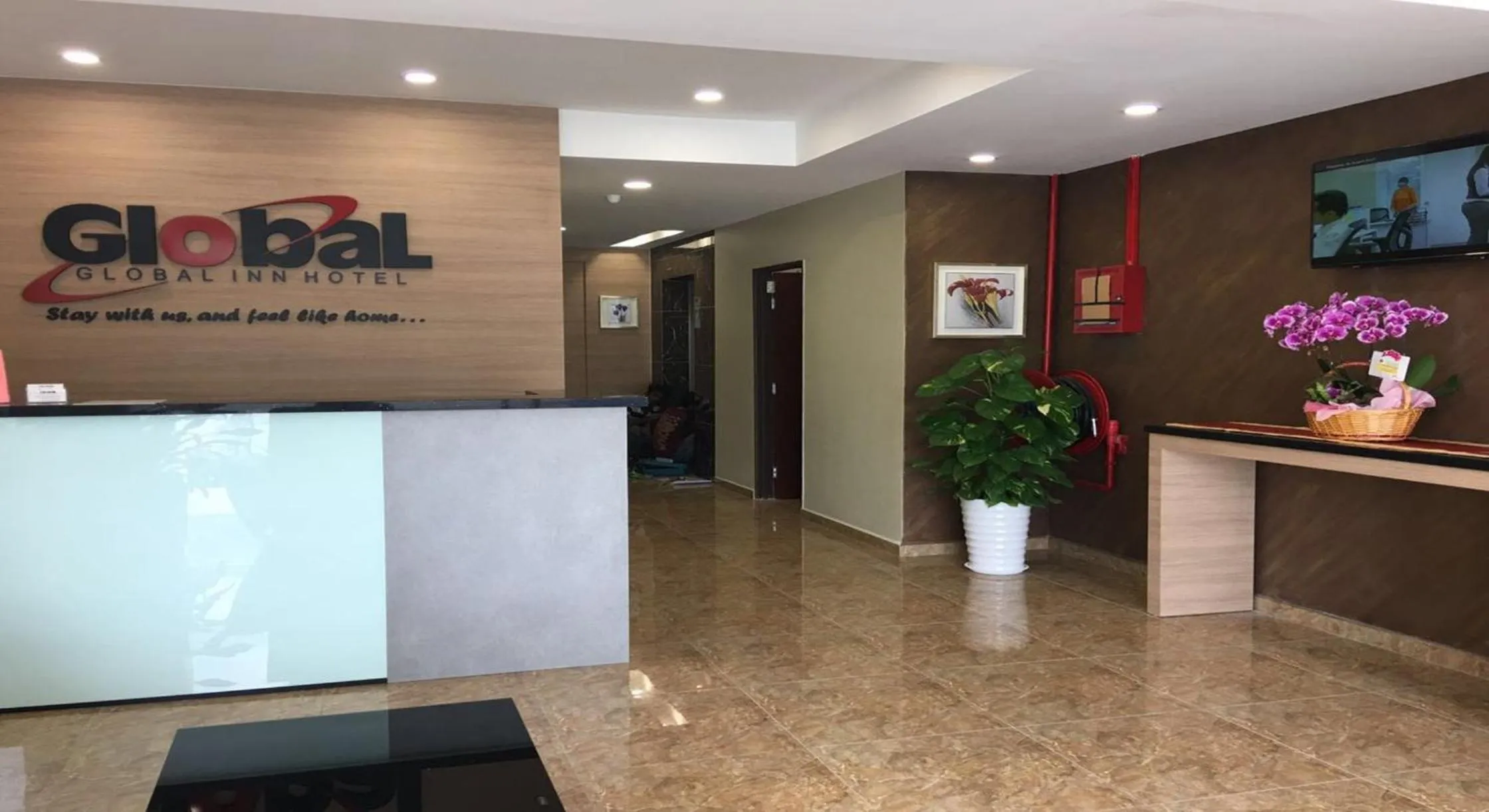 Lobby or reception in Global Inn Hotel