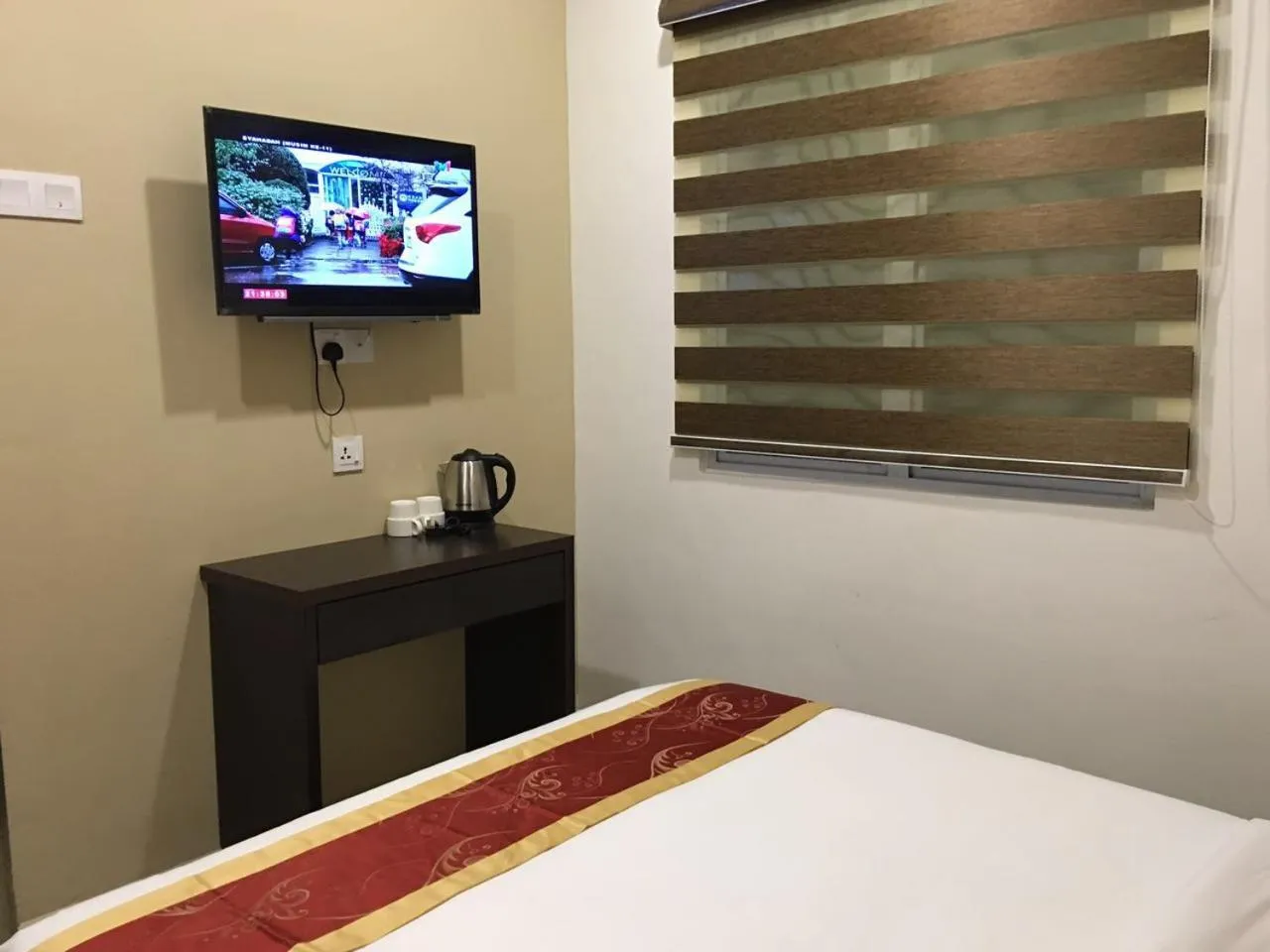 TV and multimedia, Bed in Global Inn Hotel