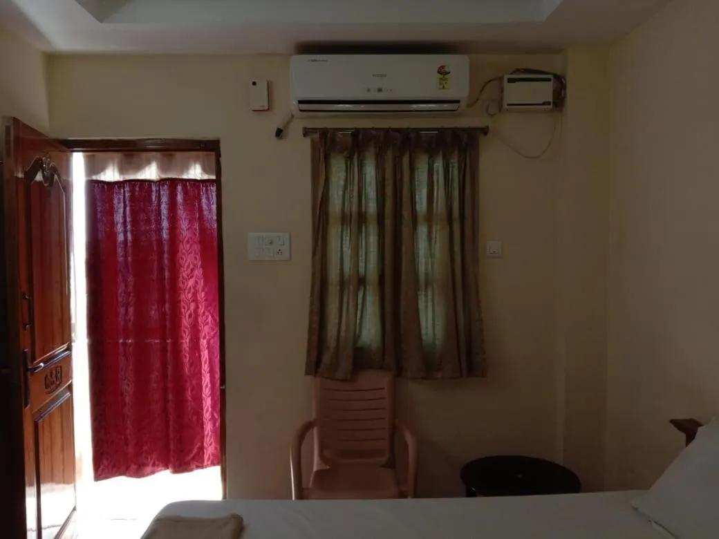 Photo of the whole room, Bed in Shubhanga Residency