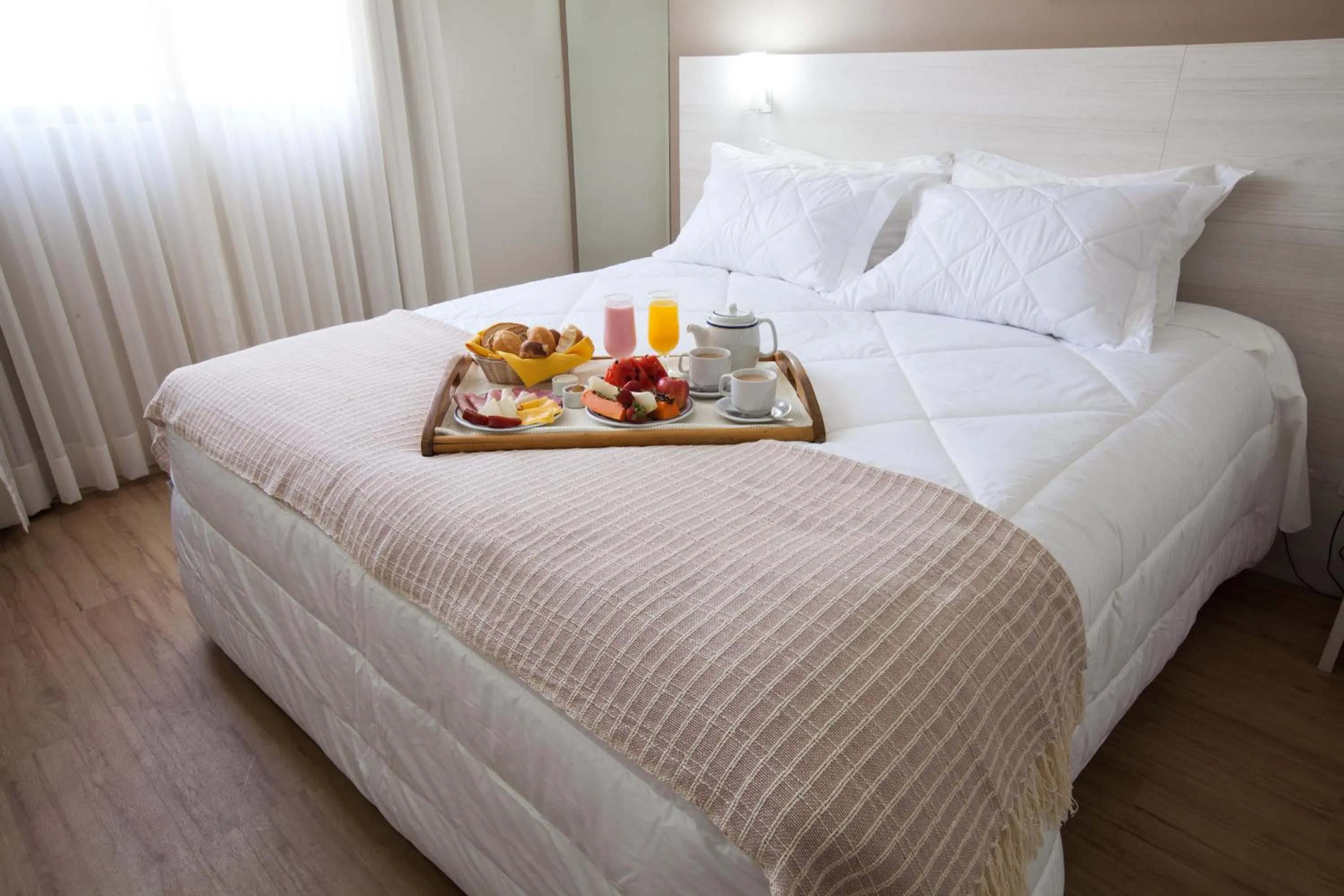 Bed in Hotel Plaza Camboriú