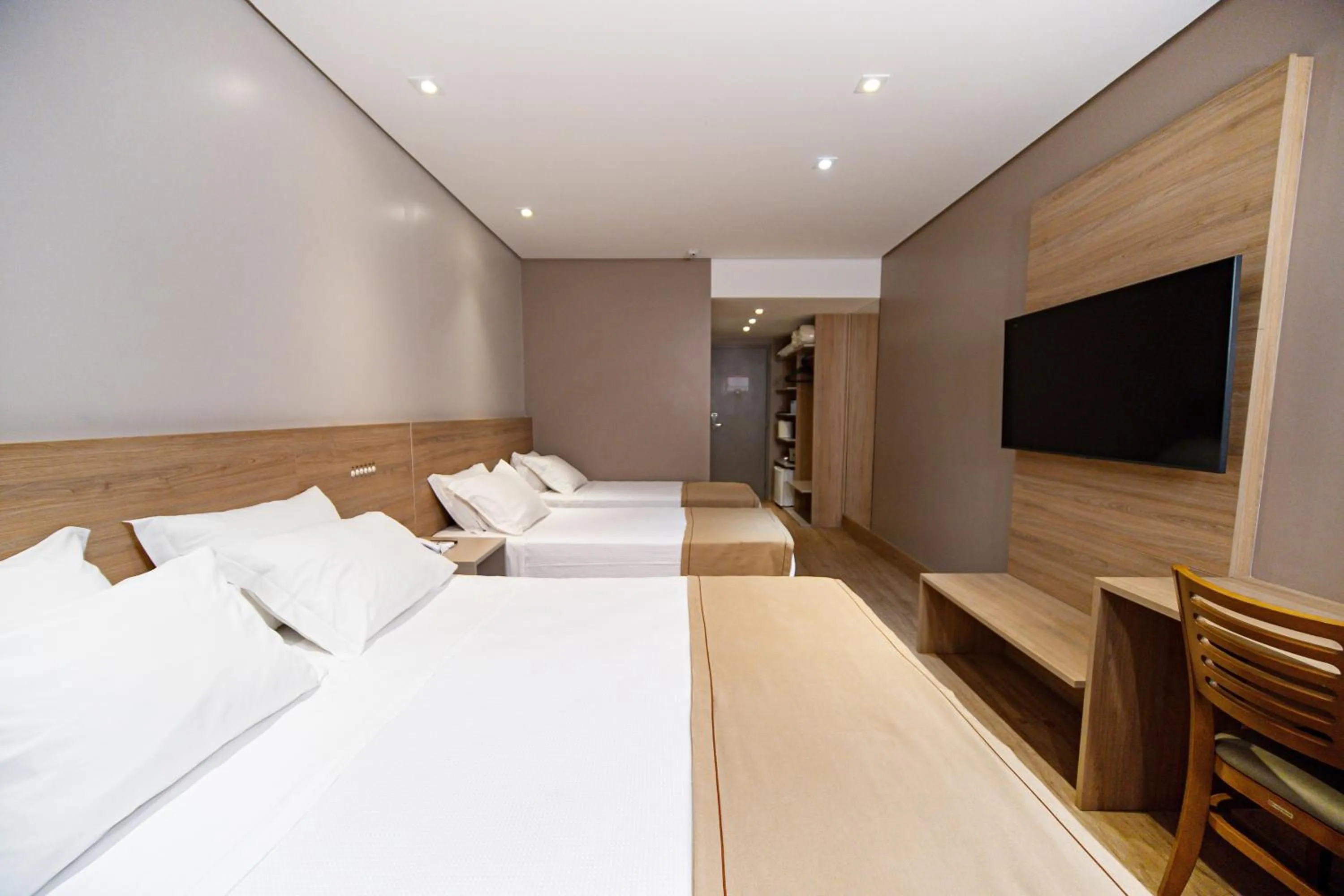 Bed in Hotel Plaza Camboriú