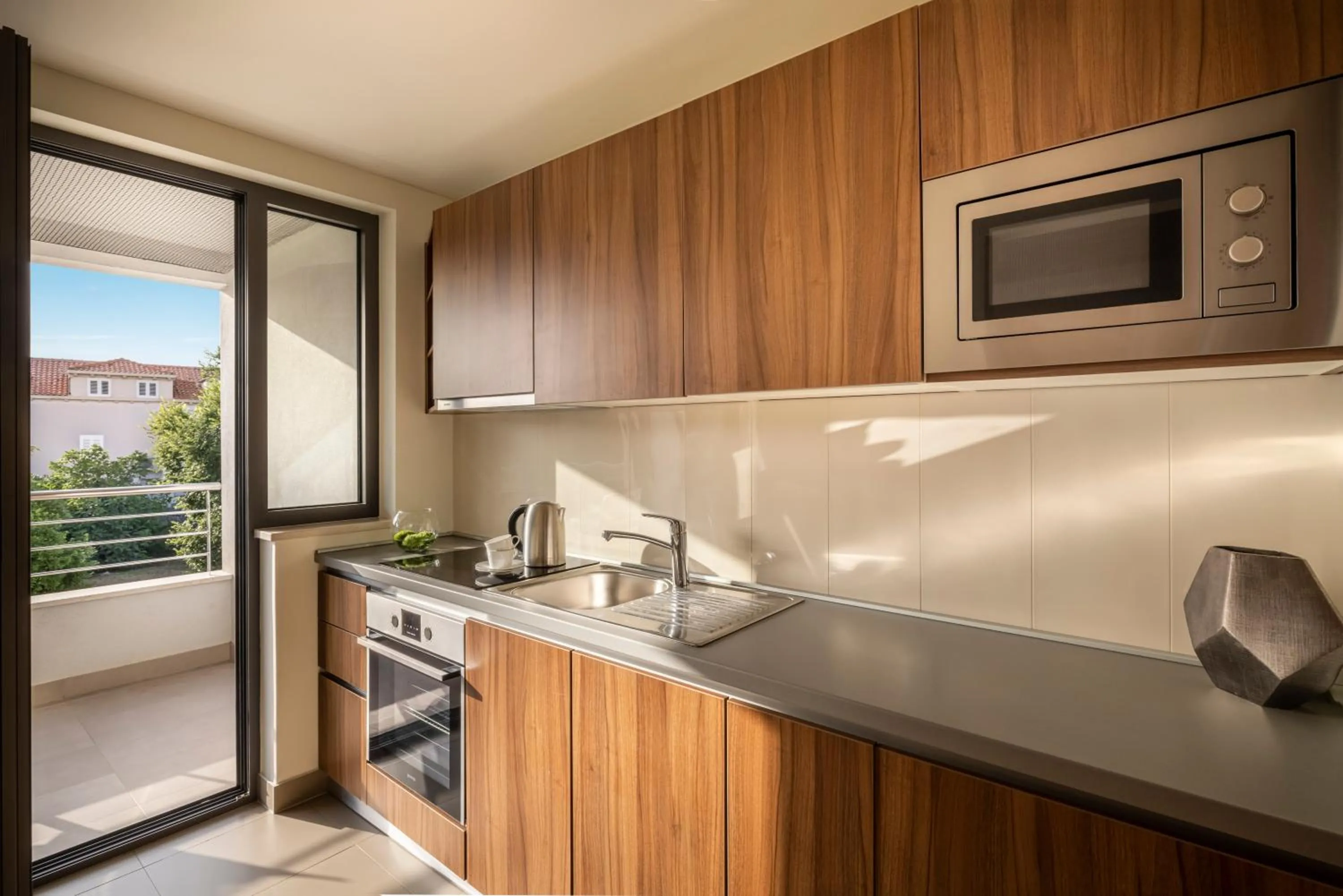 Kitchen or kitchenette in Maistra Select Srebreno Premium Apartments