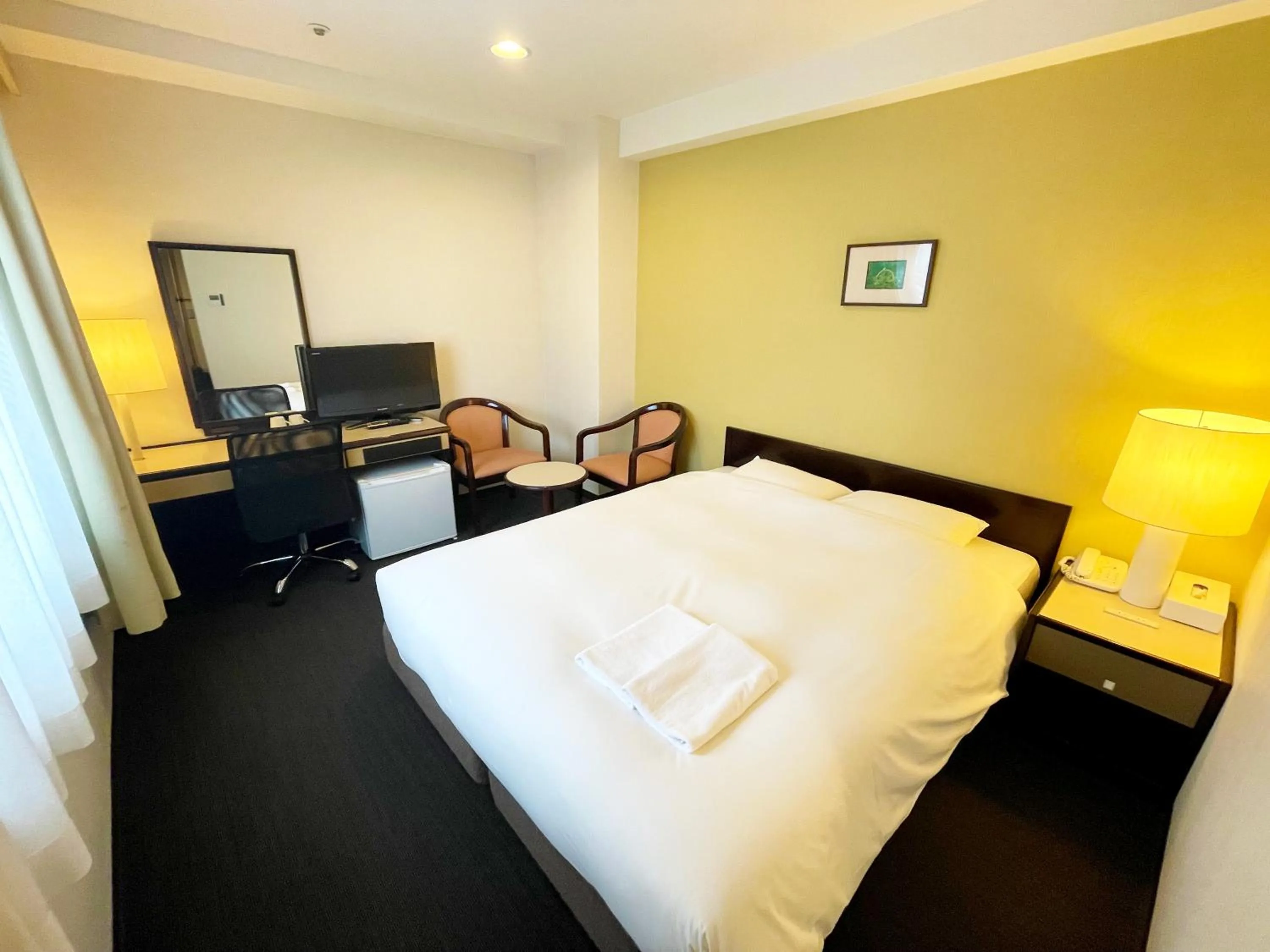 Photo of the whole room, Bed in Smile Hotel Yonago