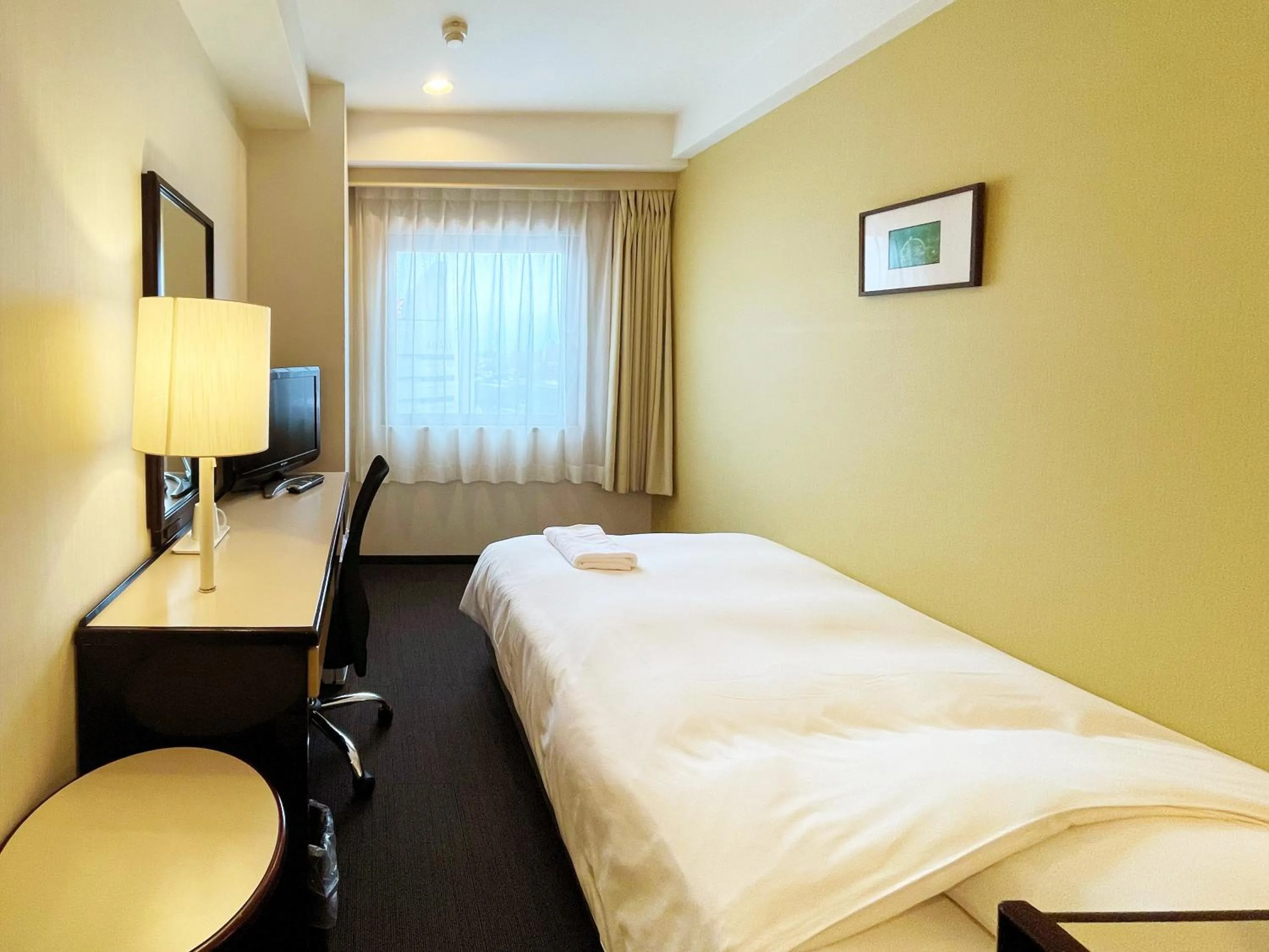 Photo of the whole room, Bed in Smile Hotel Yonago