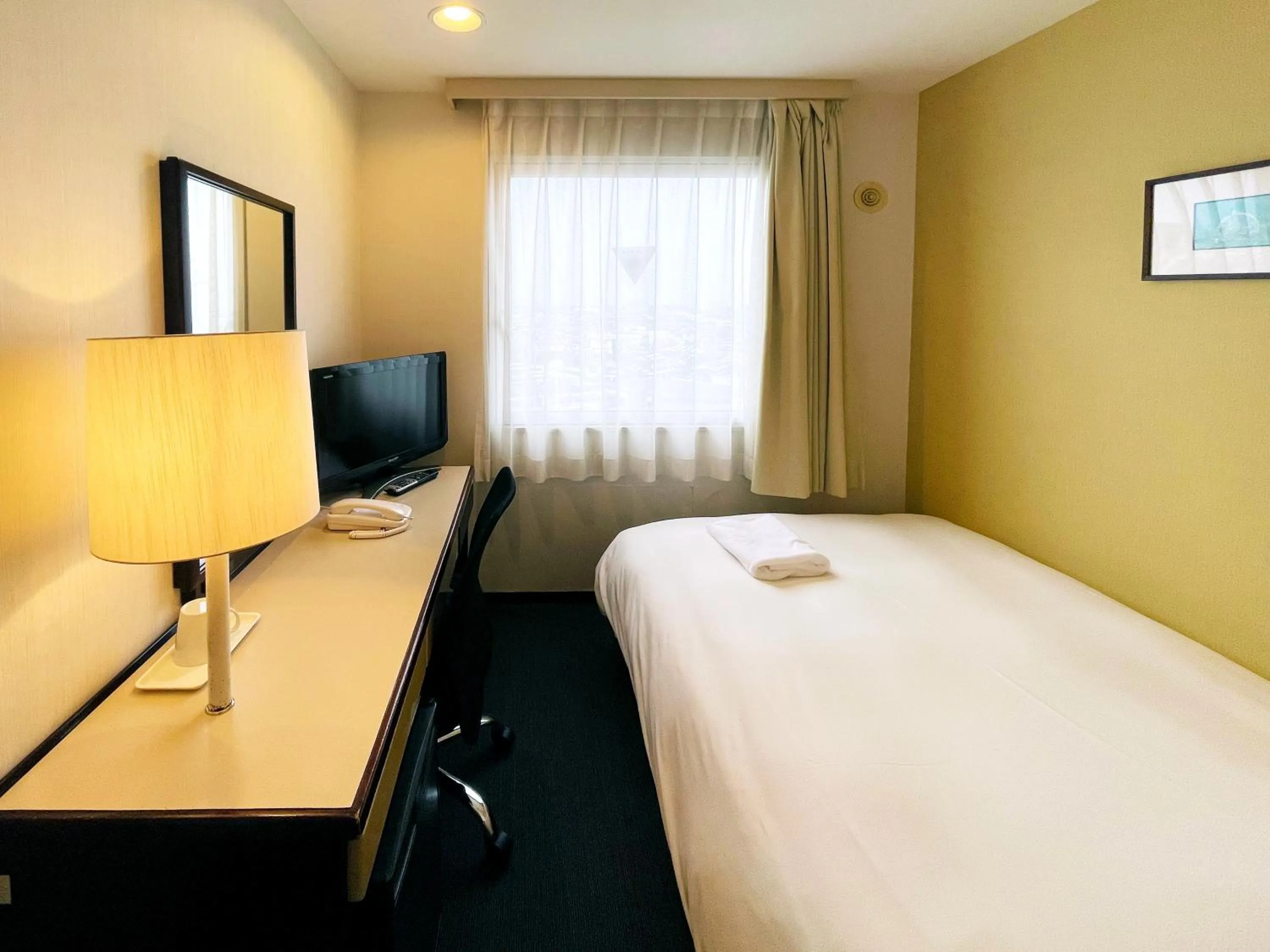 Photo of the whole room, Bed in Smile Hotel Yonago