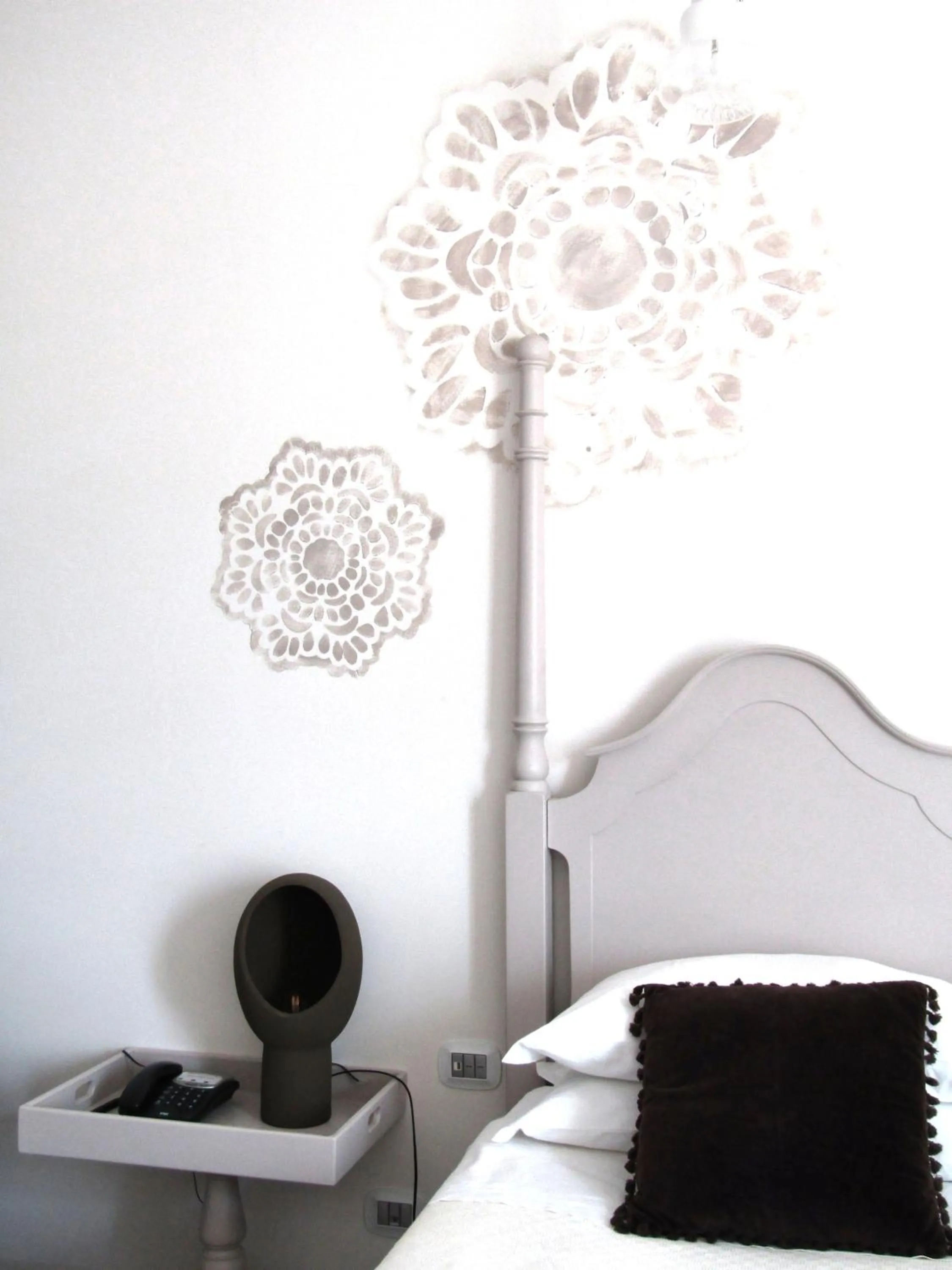 Decorative detail, Bed in Palazzo Conti Camere & Suites