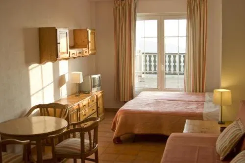 Photo of the whole room, Bed in Apartamentos Montreal