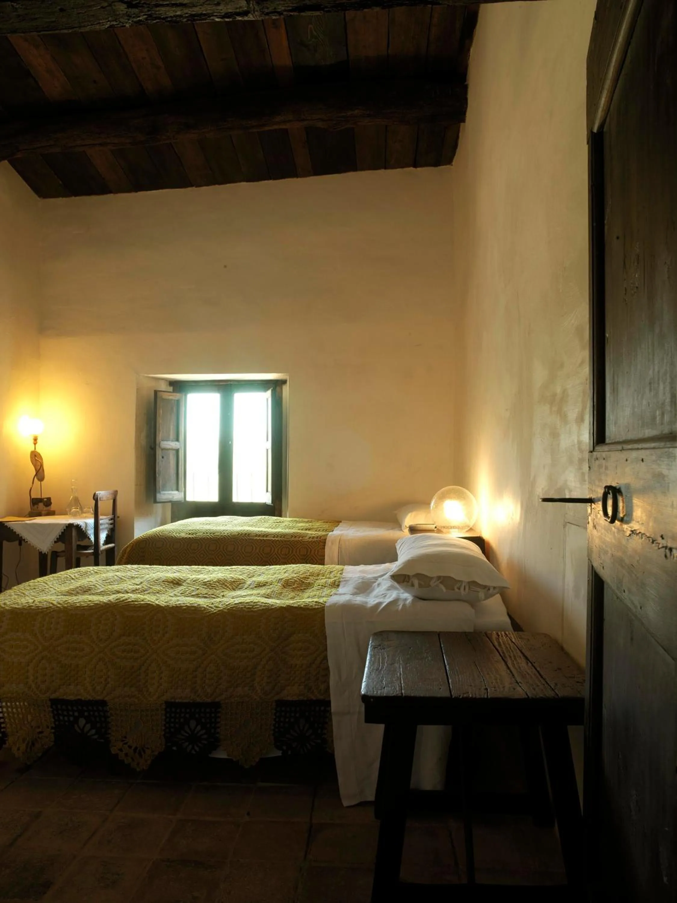 Photo of the whole room, Bed in Sextantio Albergo Diffuso