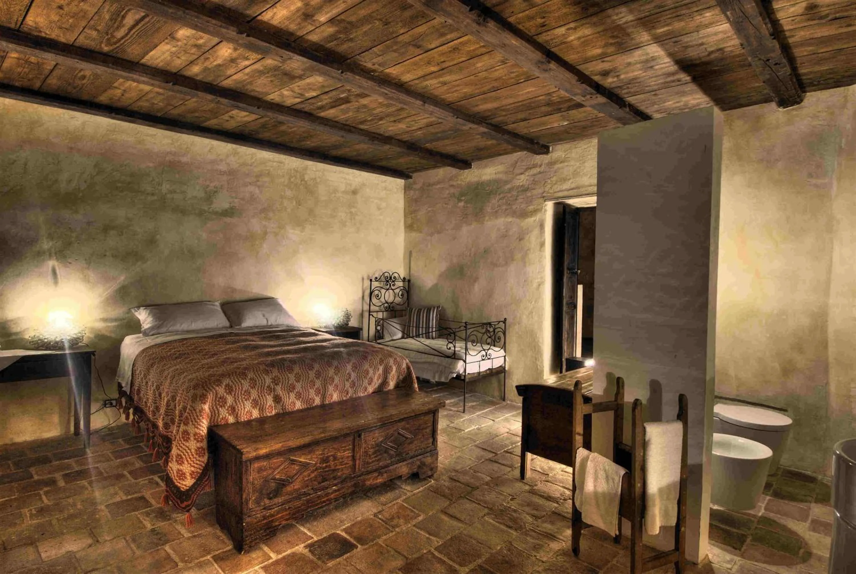 Photo of the whole room, Bed in Sextantio Albergo Diffuso