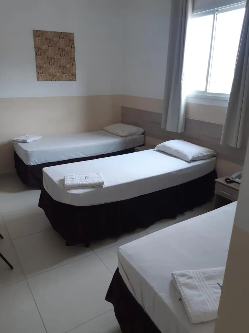 Bed in Hotel Araçari