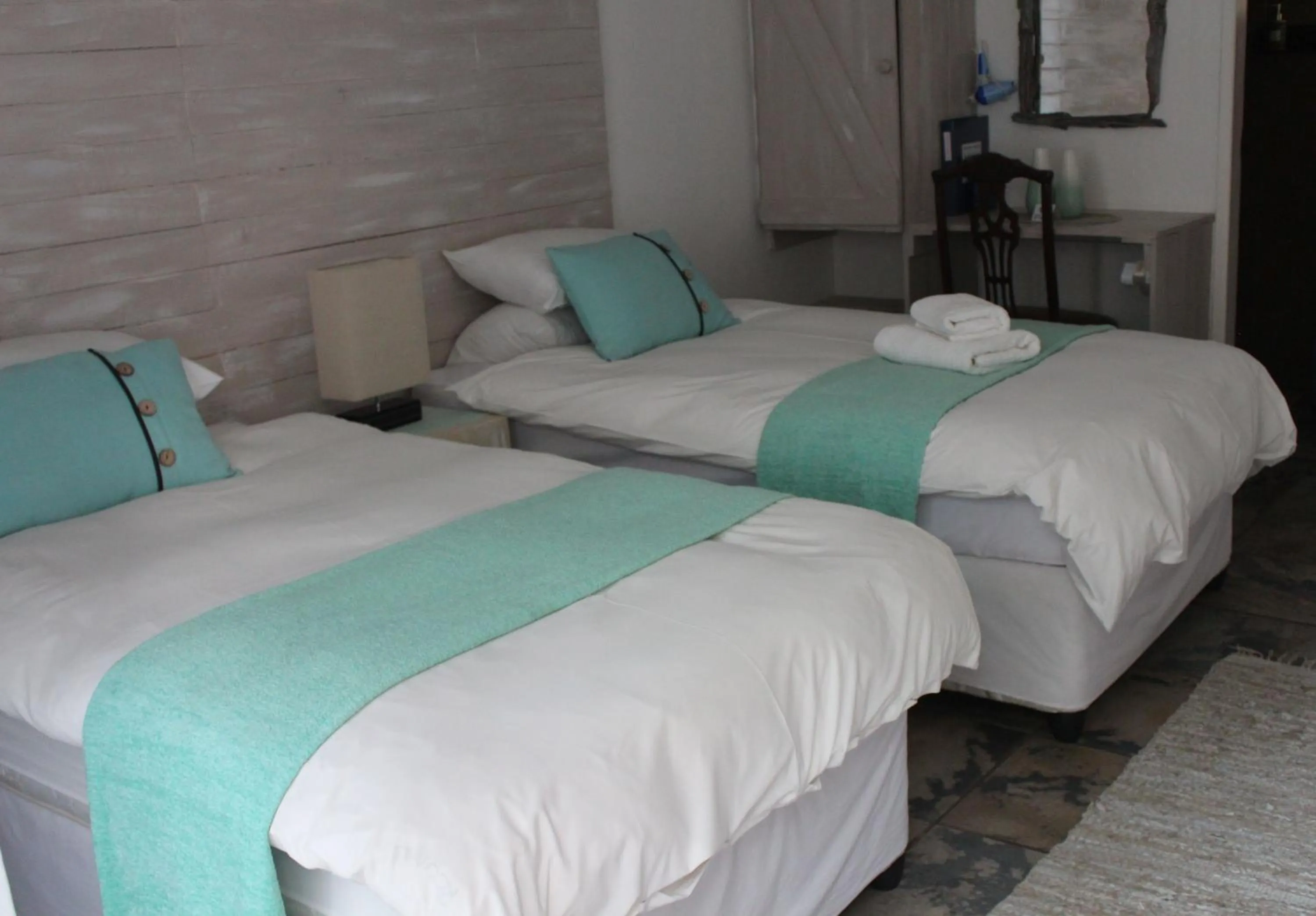 Bed in Ukarimu Guest House