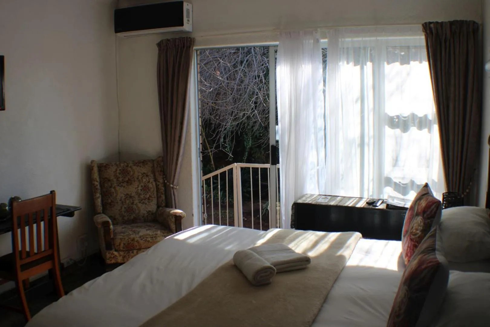 Bed in Ukarimu Guest House