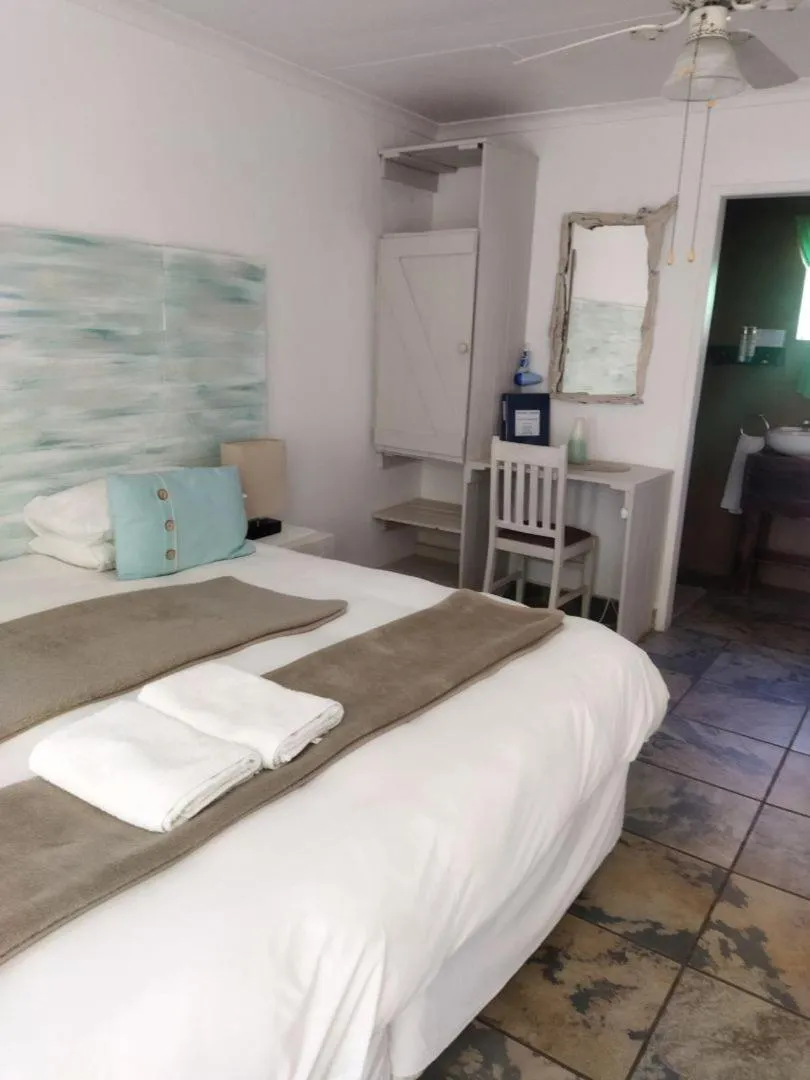 Bed in Ukarimu Guest House