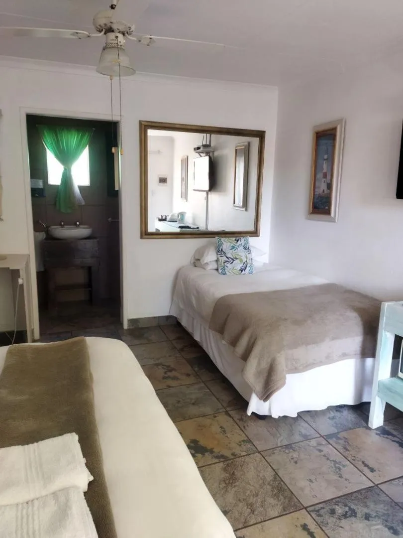 Bed in Ukarimu Guest House