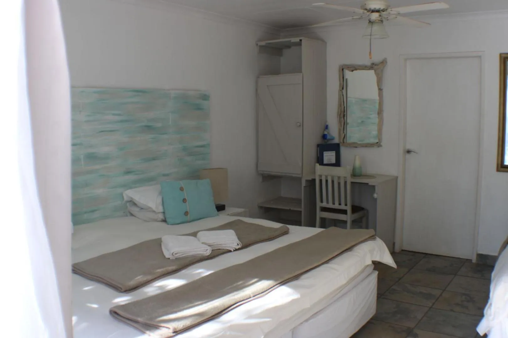 Bed in Ukarimu Guest House