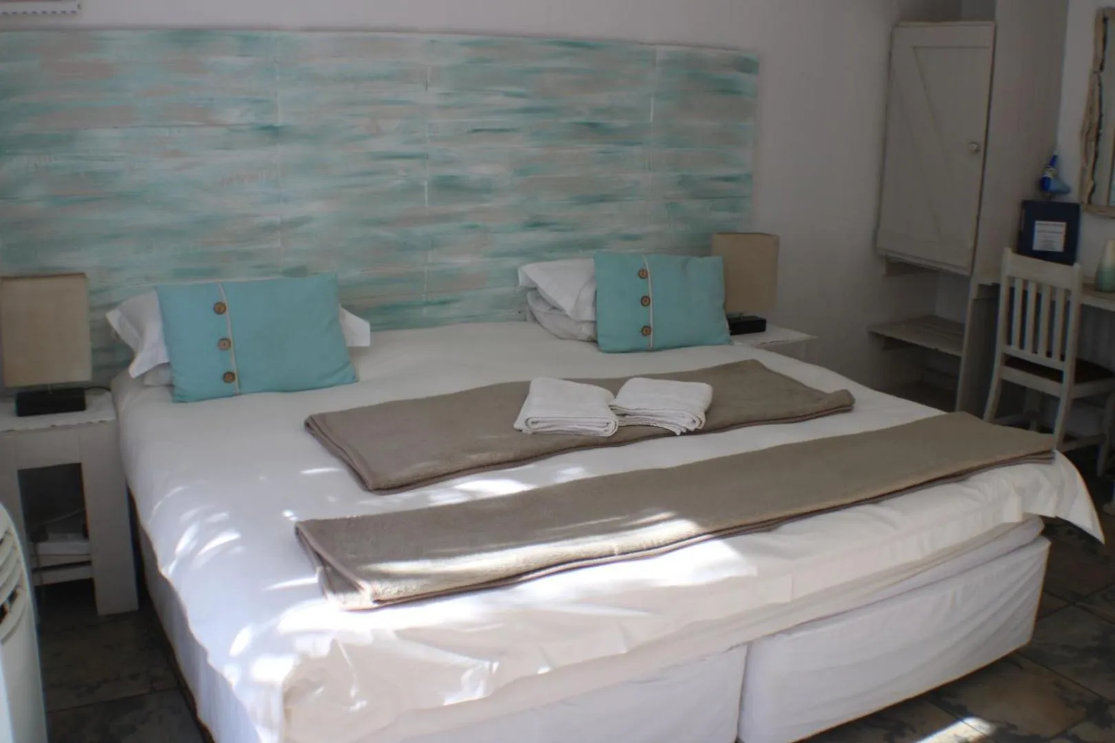 Bed in Ukarimu Guest House