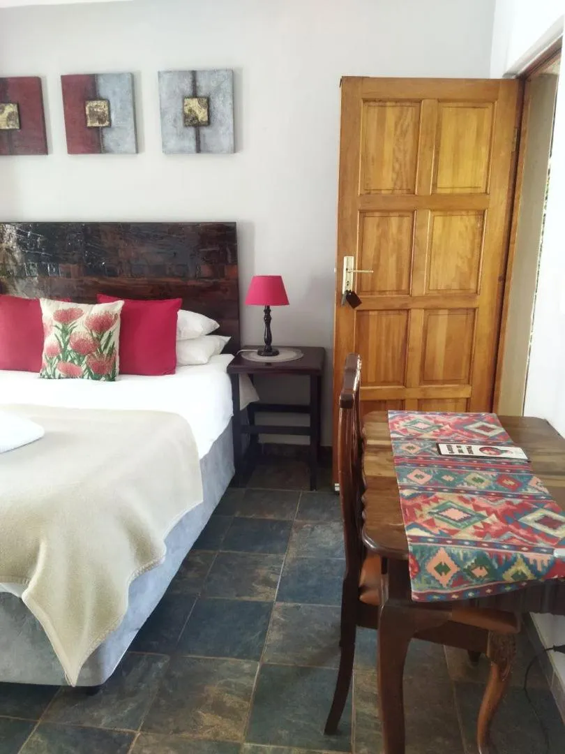 Bed in Ukarimu Guest House