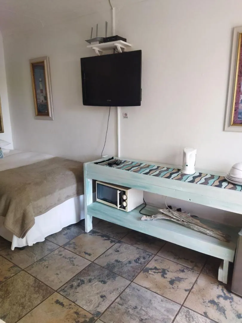 Bed in Ukarimu Guest House